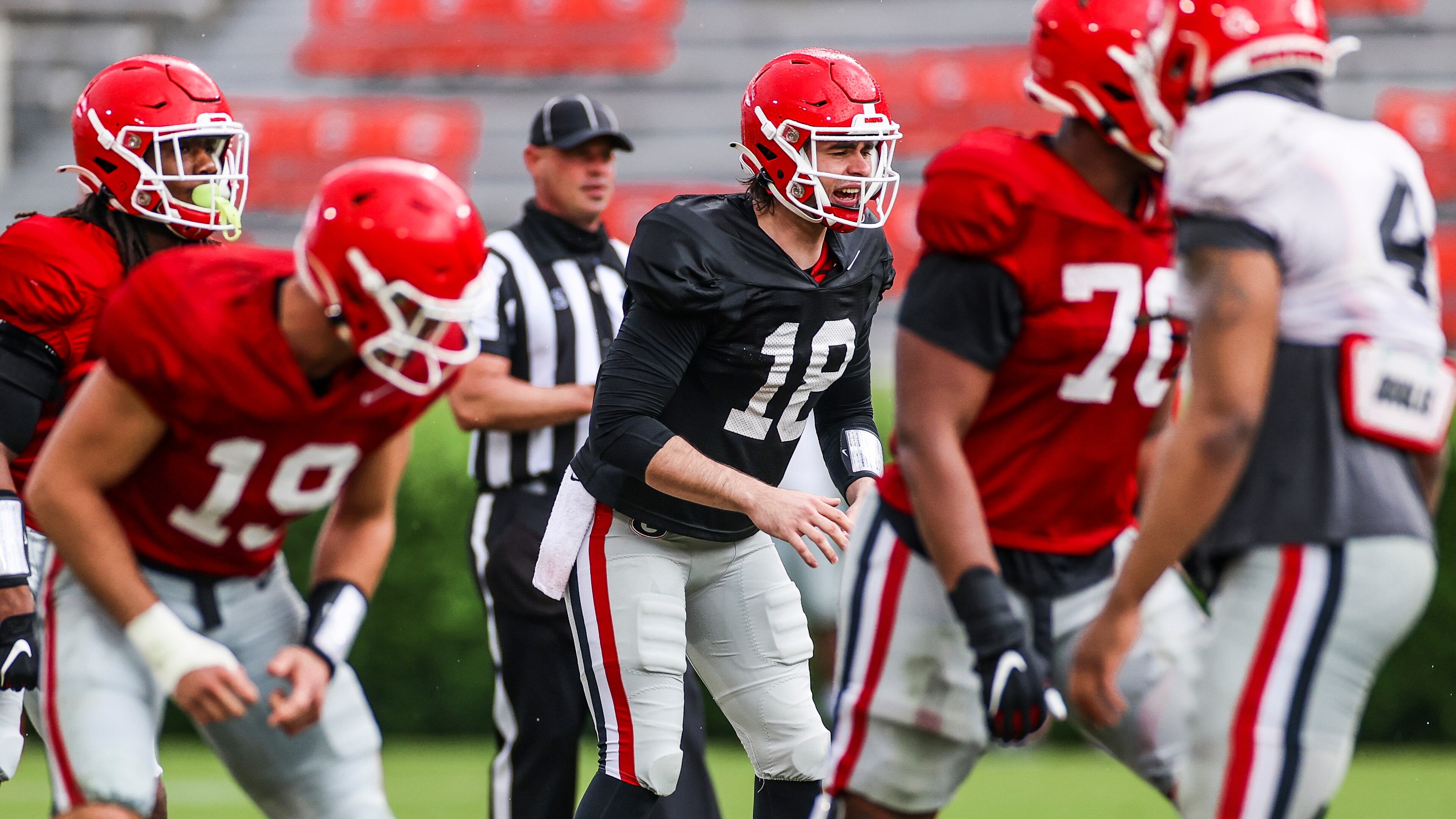 Georgia quarterback JT Daniels (18) calls a play during the Bulldogs’ scrimmage Saturday, April 10, 2021, on Dooley Field at Sanford Stadium in Athens. (Tony Walsh/UGA)