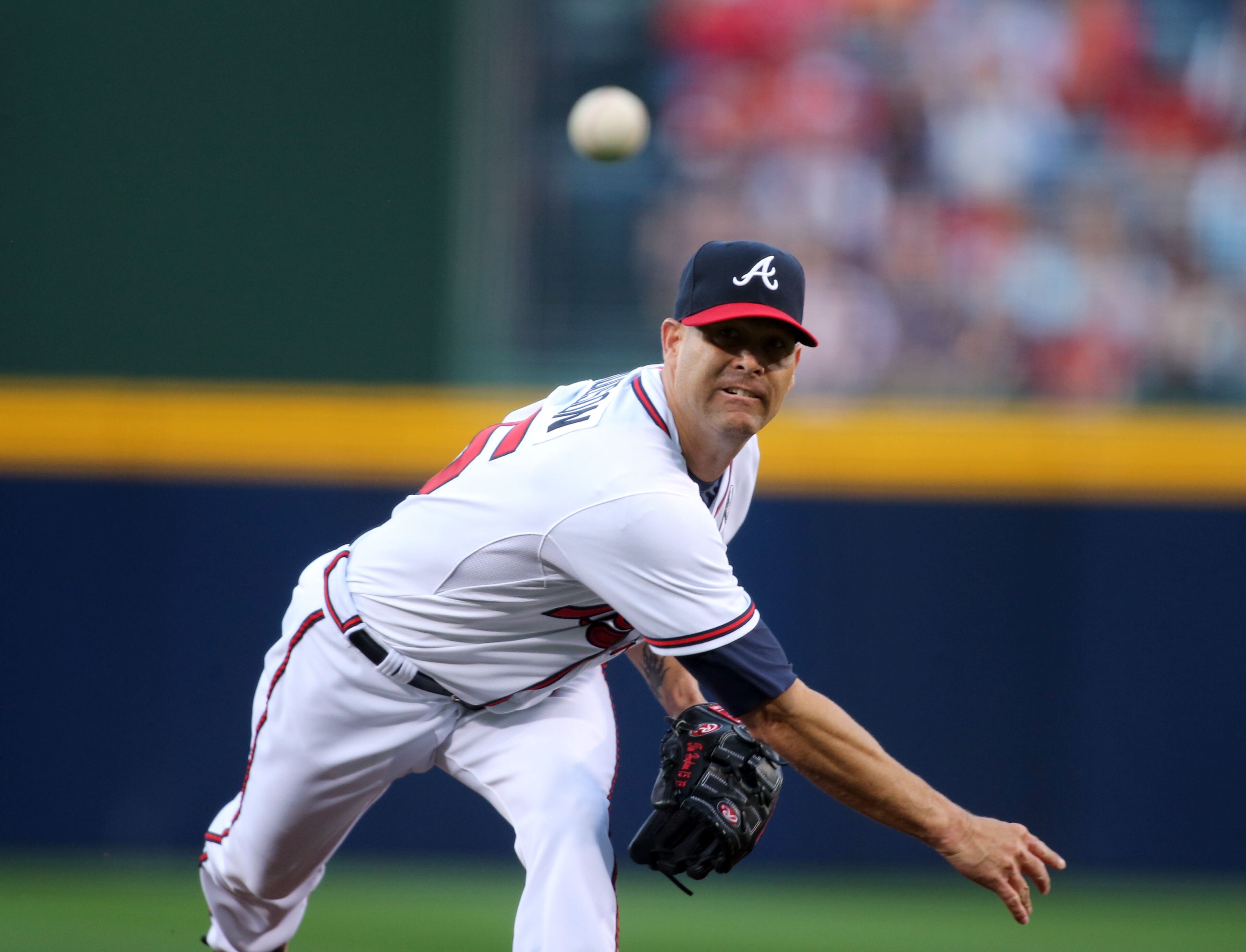 Atlanta Braves starting pitcher Tim Hudson delivers a pitch in the first inning of their season opener against the Philadelphia Phillies.