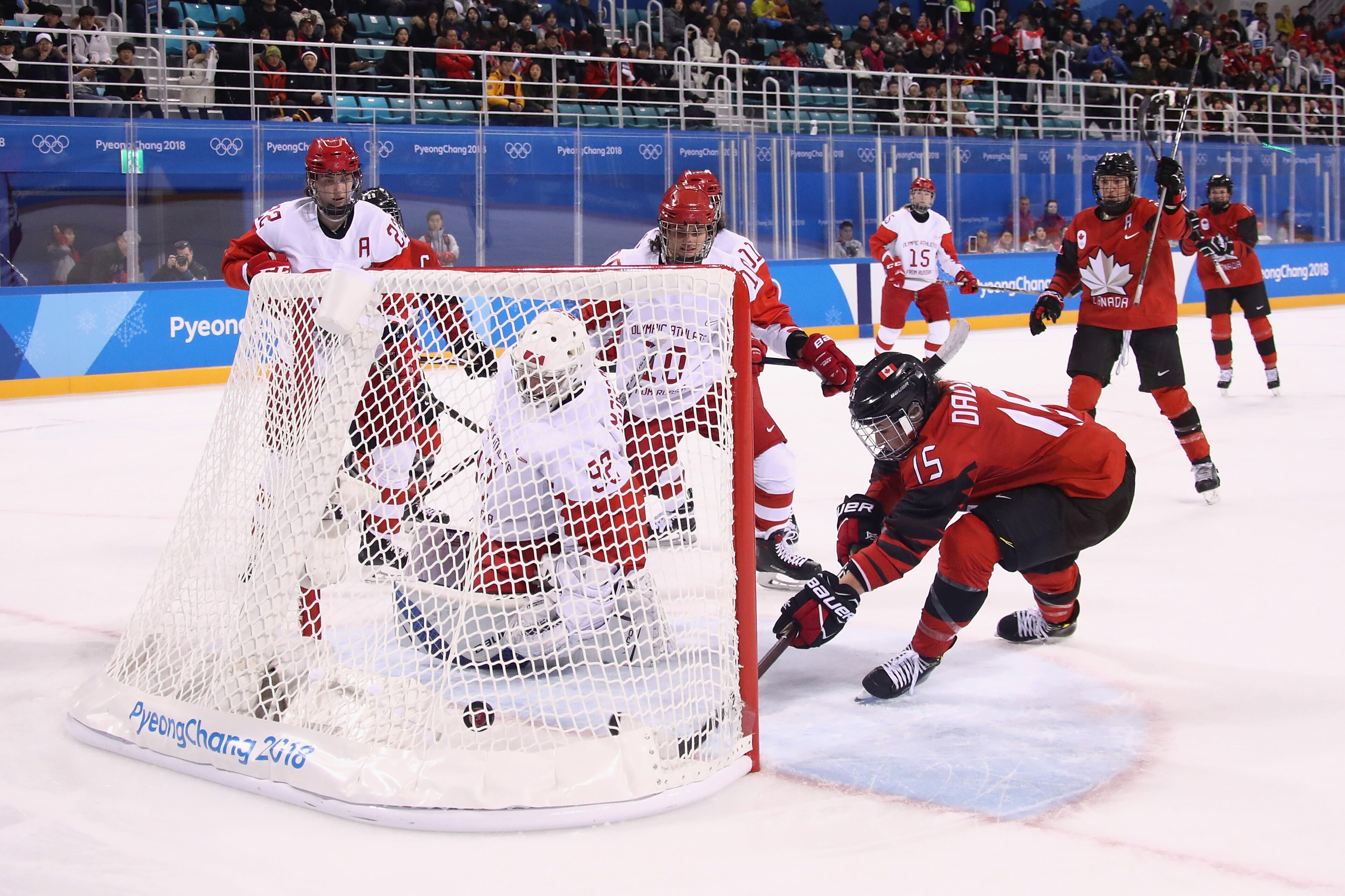 GANGNEUNG, SOUTH KOREA - FEBRUARY 11: Melodie Daoust #15 of Canada scores a goal against Nadezhda Morozova #92 of Olympic Athlete from Russia in the third period during the Women's Ice Hockey Preliminary Round - Group A game on day two of the PyeongChang 2018 Winter Olympic Games at Kwandong Hockey Centre on February 11, 2018 in Gangneung, South Korea. (Photo by Bruce Bennett/Getty Images)