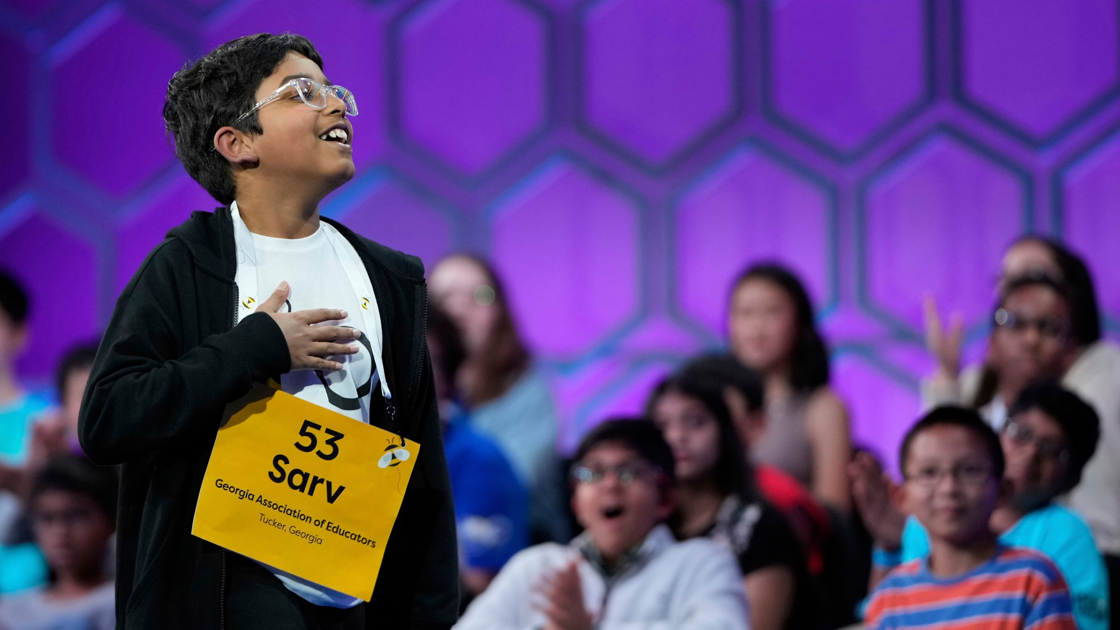 FILE - Sarv Dharavane, 11, of Tucker, Ga., reacts after spelling his word correctly in the finals of the Scripps National Spelling Bee, Thursday, May 29, 2025, in Oxon Hill, Md. (AP Photo/Julia Demaree Nikhinson, File)