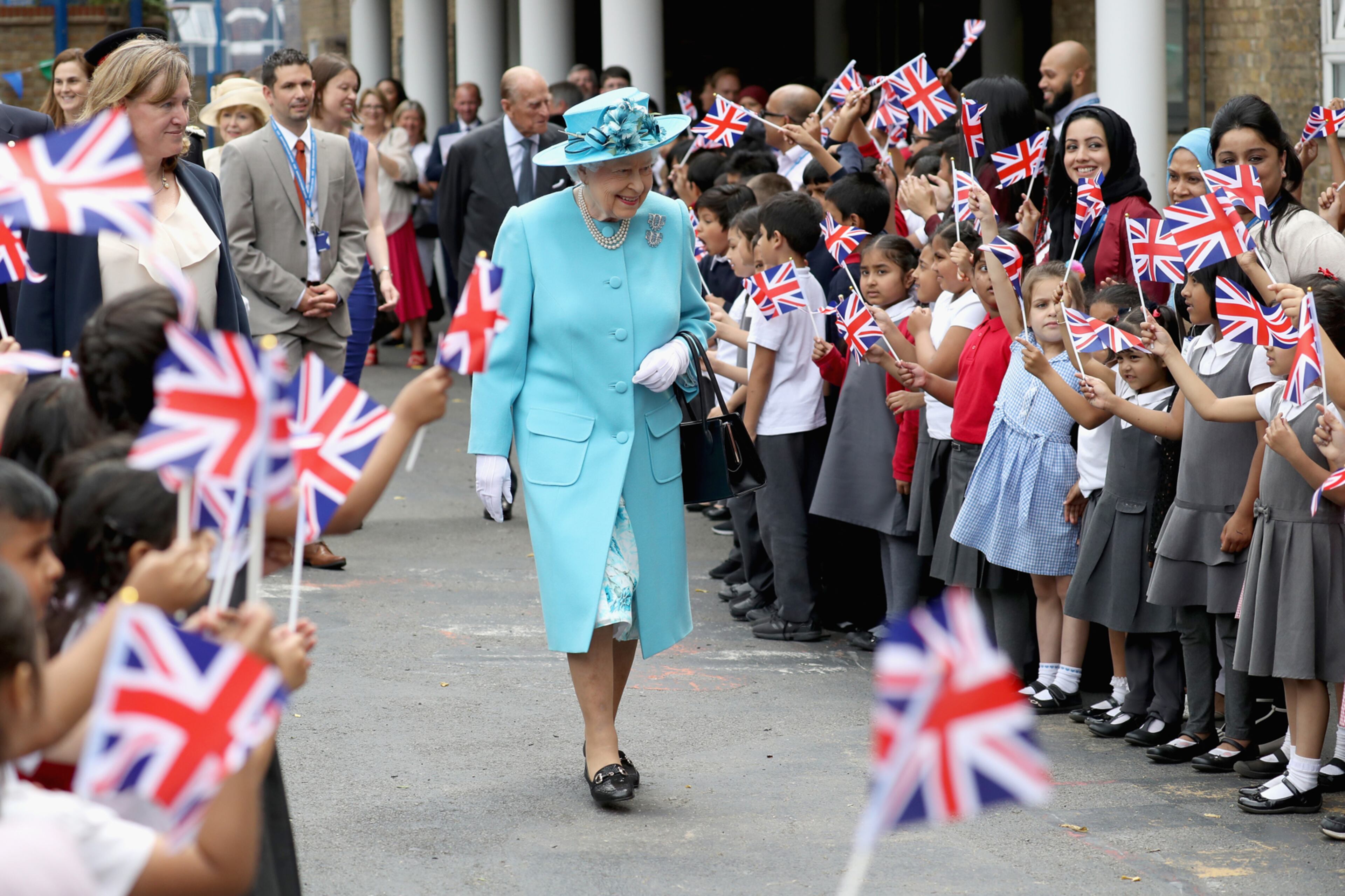 LONDON, ENGLAND - JUNE 15: Queen Elizabeth II and Prince Philip, Duke of Edinburgh leave Mayflower Primary School during an official visit to Tower Hamlets on June 15, 2017 in London, England. The visit coincides with commemorations for the centenary of the bombing of Upper North Street School during the First World War. (Photo by Chris Jackson/Getty Images)