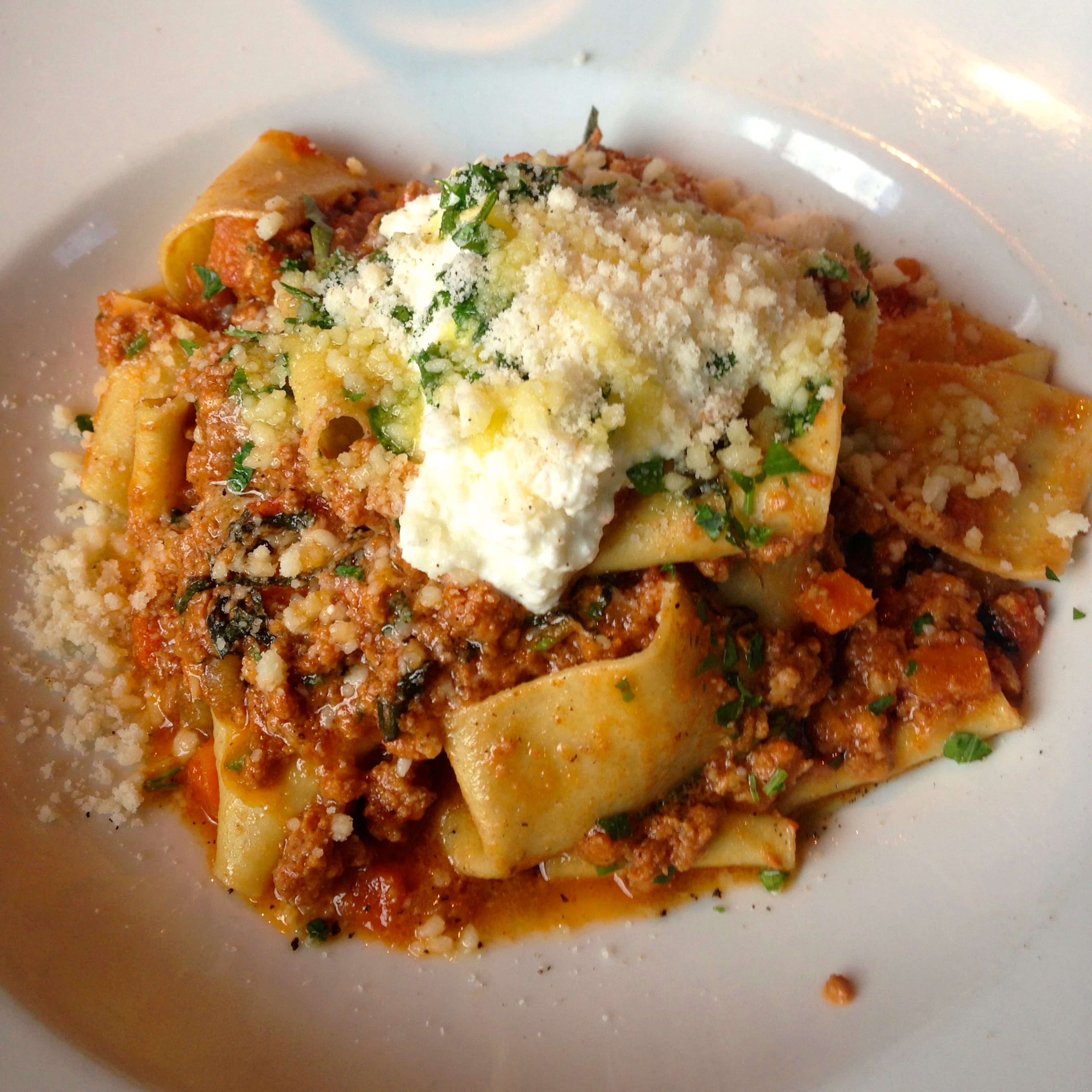 "The pappardelle featured a traditional three-meat ragù (pork, beef, veal) and house-made ricotta, but it lacked any depth of flavor and needed more seasoning. Gnocchi were chewy (not a good thing) and their sauce of pancetta, mushrooms and sage added a greasy slick."
