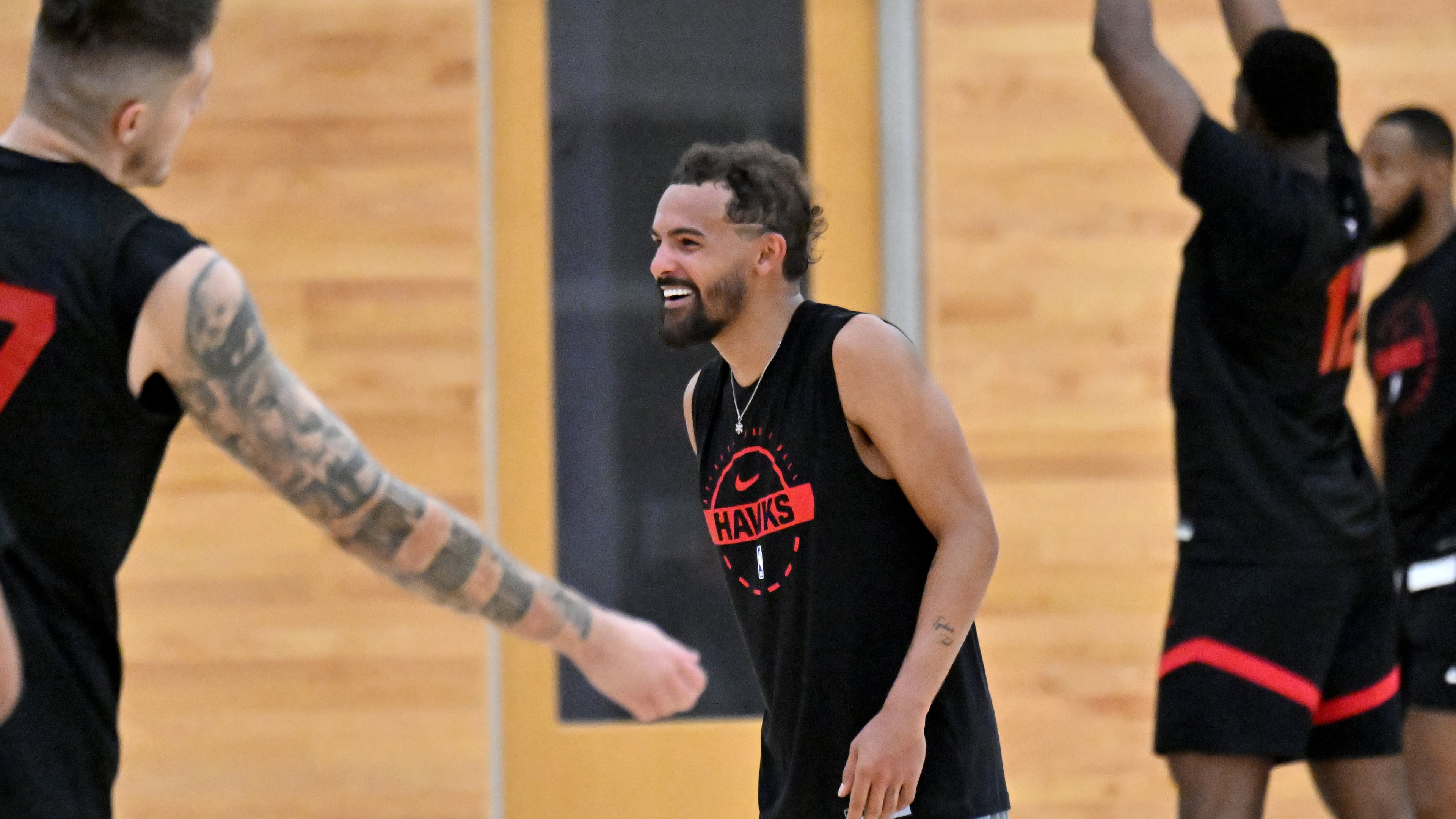 Atlanta Hawks guard Trae Young smiles during first day of Atlanta Hawks training camp at the team’s practice facility at the Emory Sports Medicine Complex, Tuesday, September 30, 2025, in Atlanta. (Hyosub Shin/AJC)