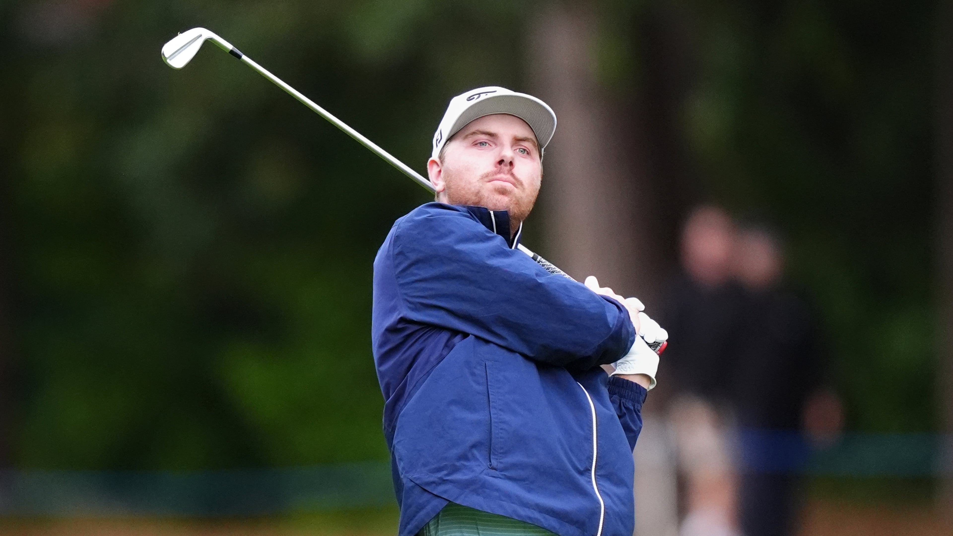 Ryan Gerard, of United States, watches his shot during the first round of the PGA Championship golf tournament in Virginia Water, England, Thursday, Sept. 17, 2026. (Adam Davy/PA via AP)