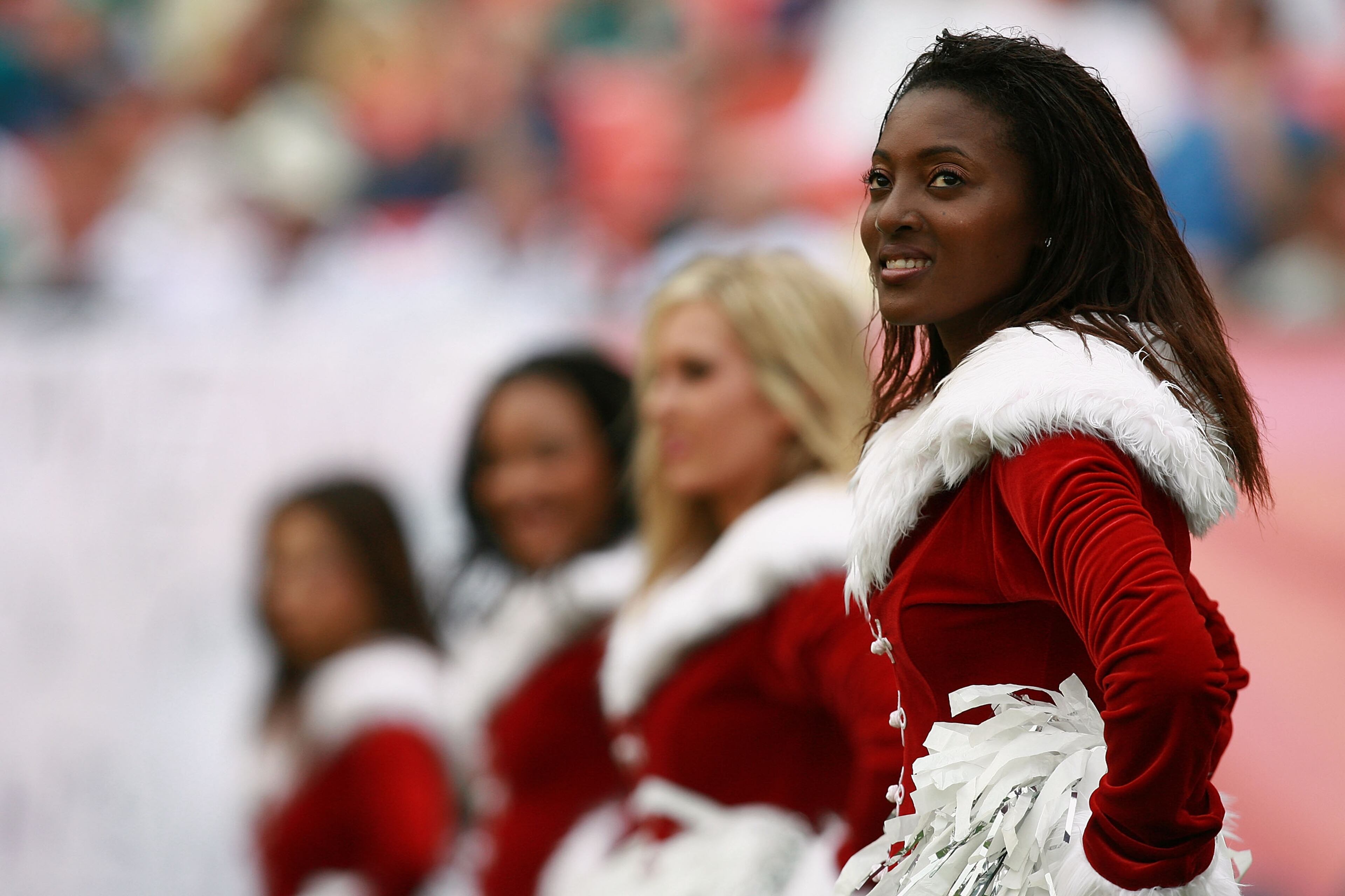Dolphins cheerleaders are dressed in Christmas outfits as the Baltimore Ravens take on the Miami Dolphins at Dolphin Stadium Dec. 16, 2007 in Miami.