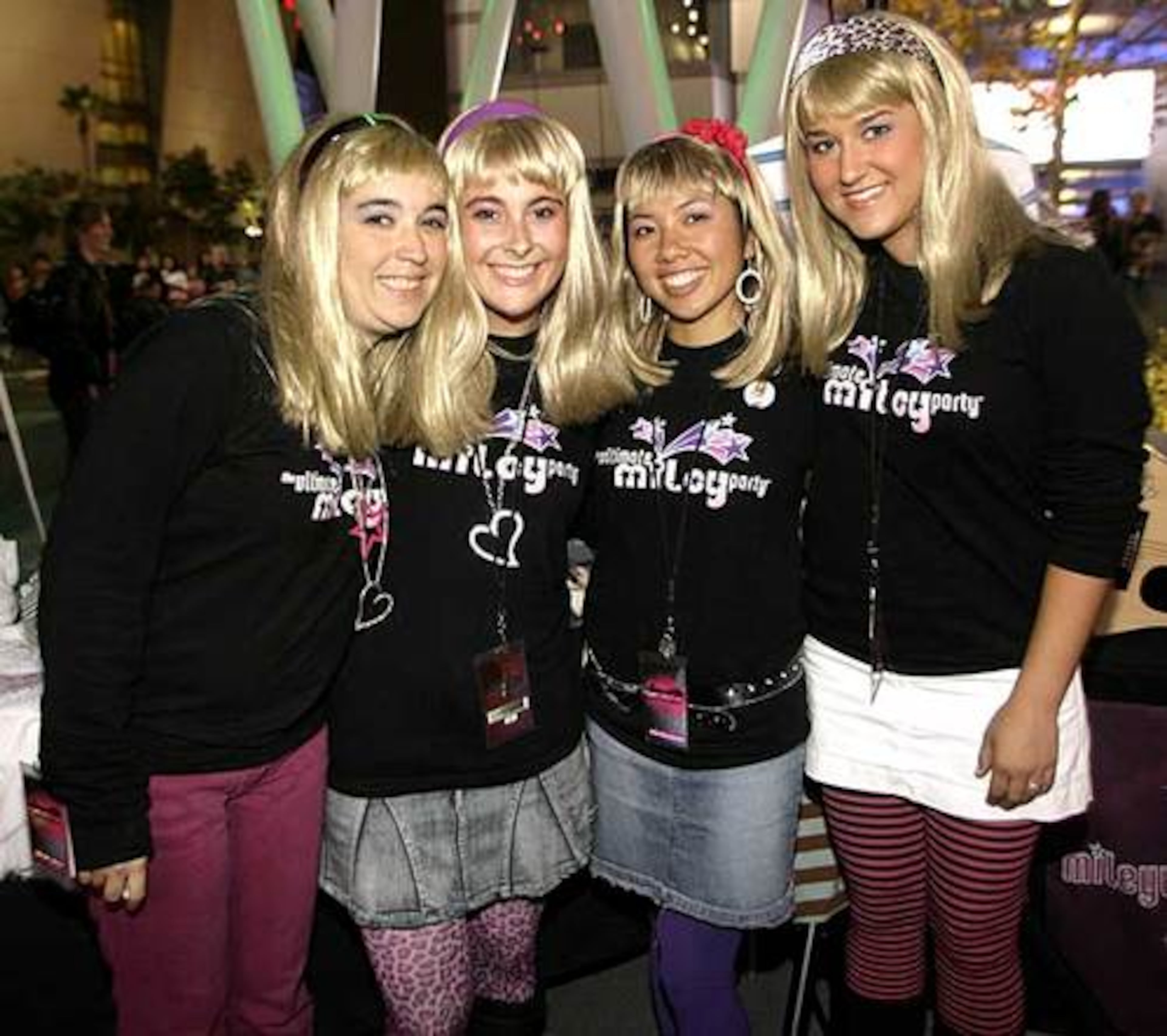 MileyWorld girls pose for a photo as fans of Miley Cyrus participate in the Ultimate Miley Party Bus Tour 2007.