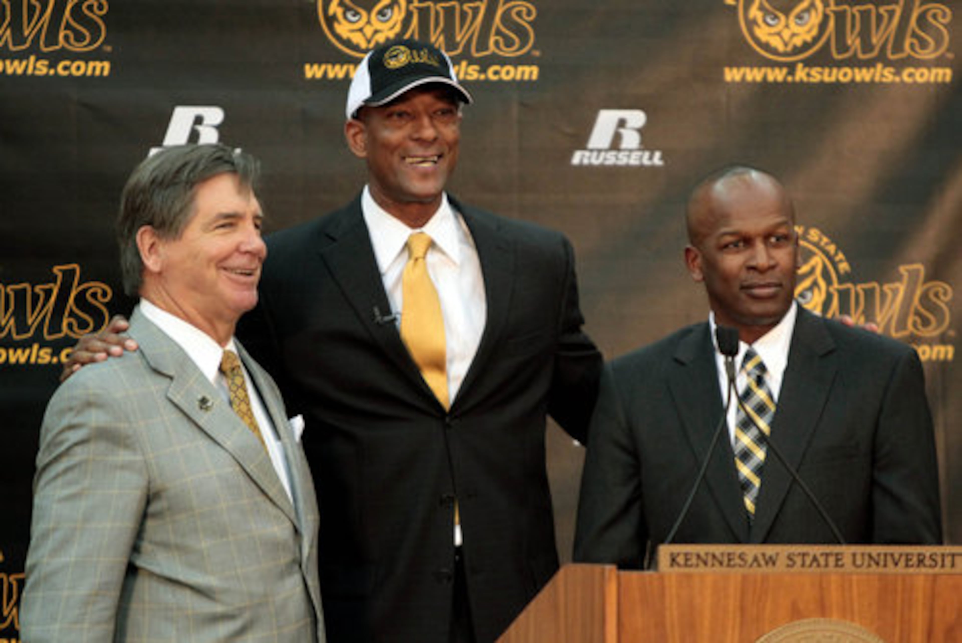 KSU men's basketball coach Lewis Preston, center, stands with KSU President Dr. Daniel Papp, left, and KSU Athletic Director Vaughn Williams, right, at the KSU Convocation Center Tuesday. Preston is the first hire made by Williams, who was just introduced last week and won't officially take over until May.