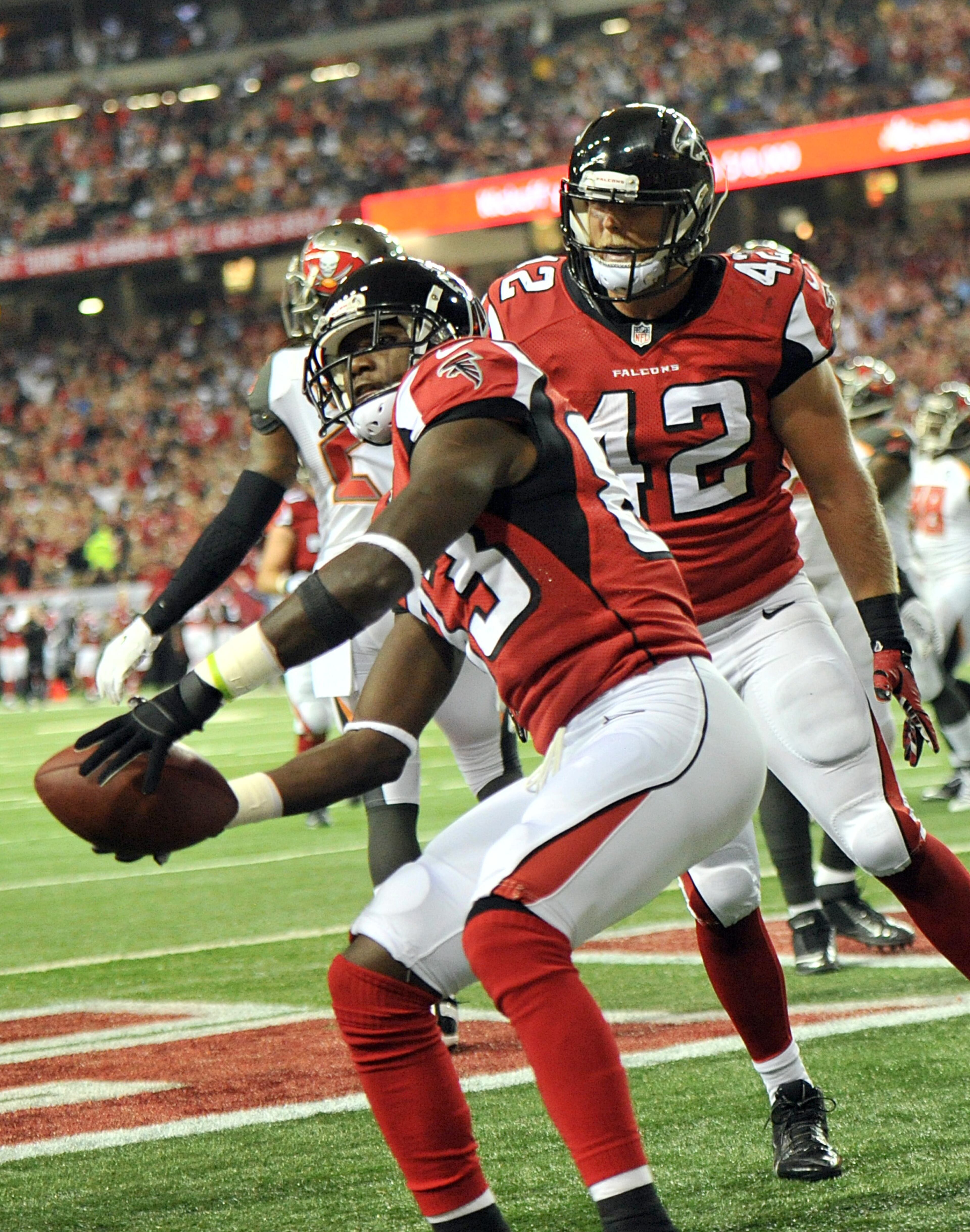 Atlanta Falcons wide receiver Harry Douglas (83) celebrates after he scored a touchdown against the Tampa Bay Buccaneers in the first half during the first half in their NFL football game on Thursday, September 18, 2014. HYOSUB SHIN / HSHIN@AJC.COM