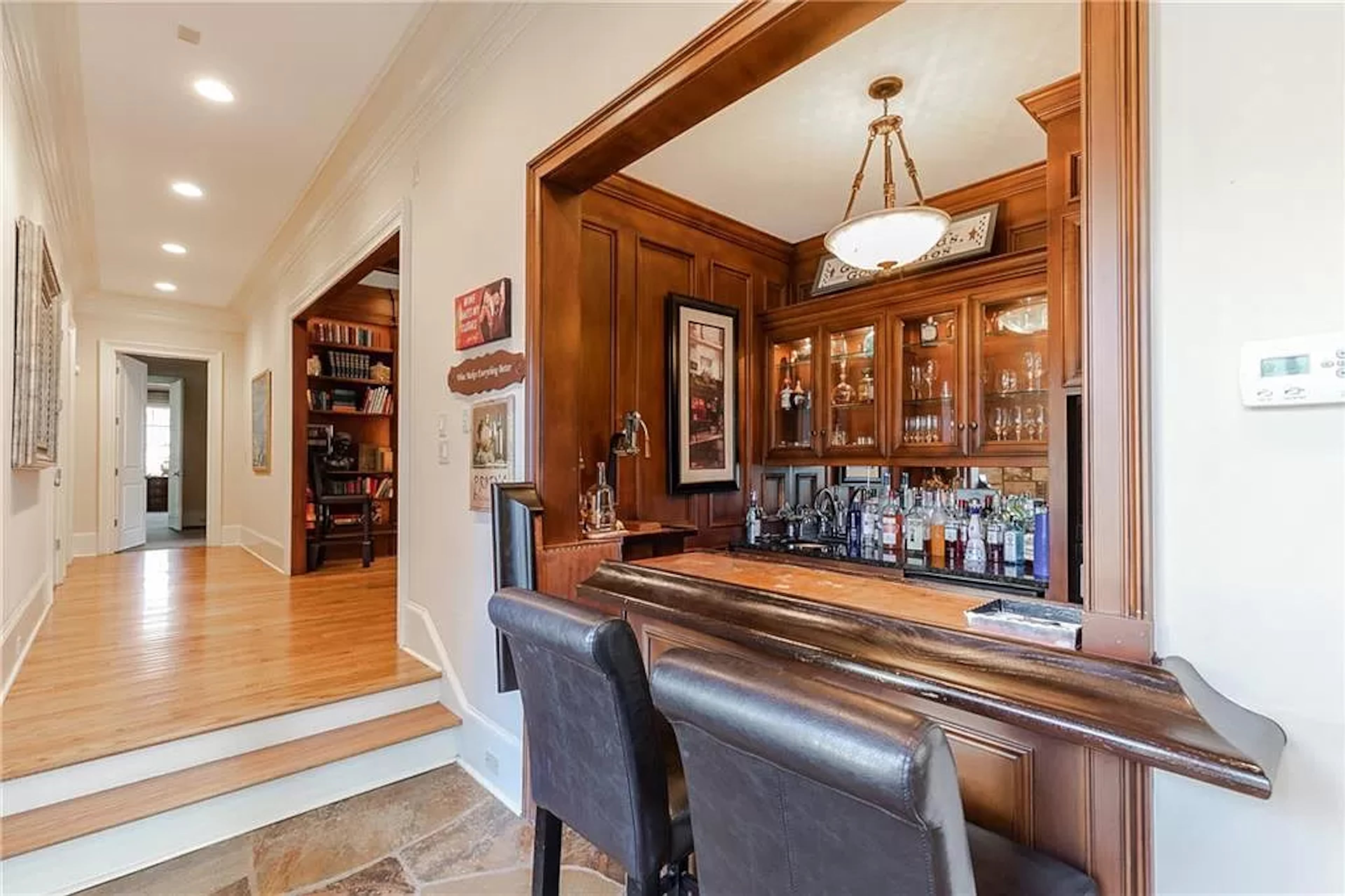 The home features incredible details and entertaining spaces, including this wet bar on the main floor.