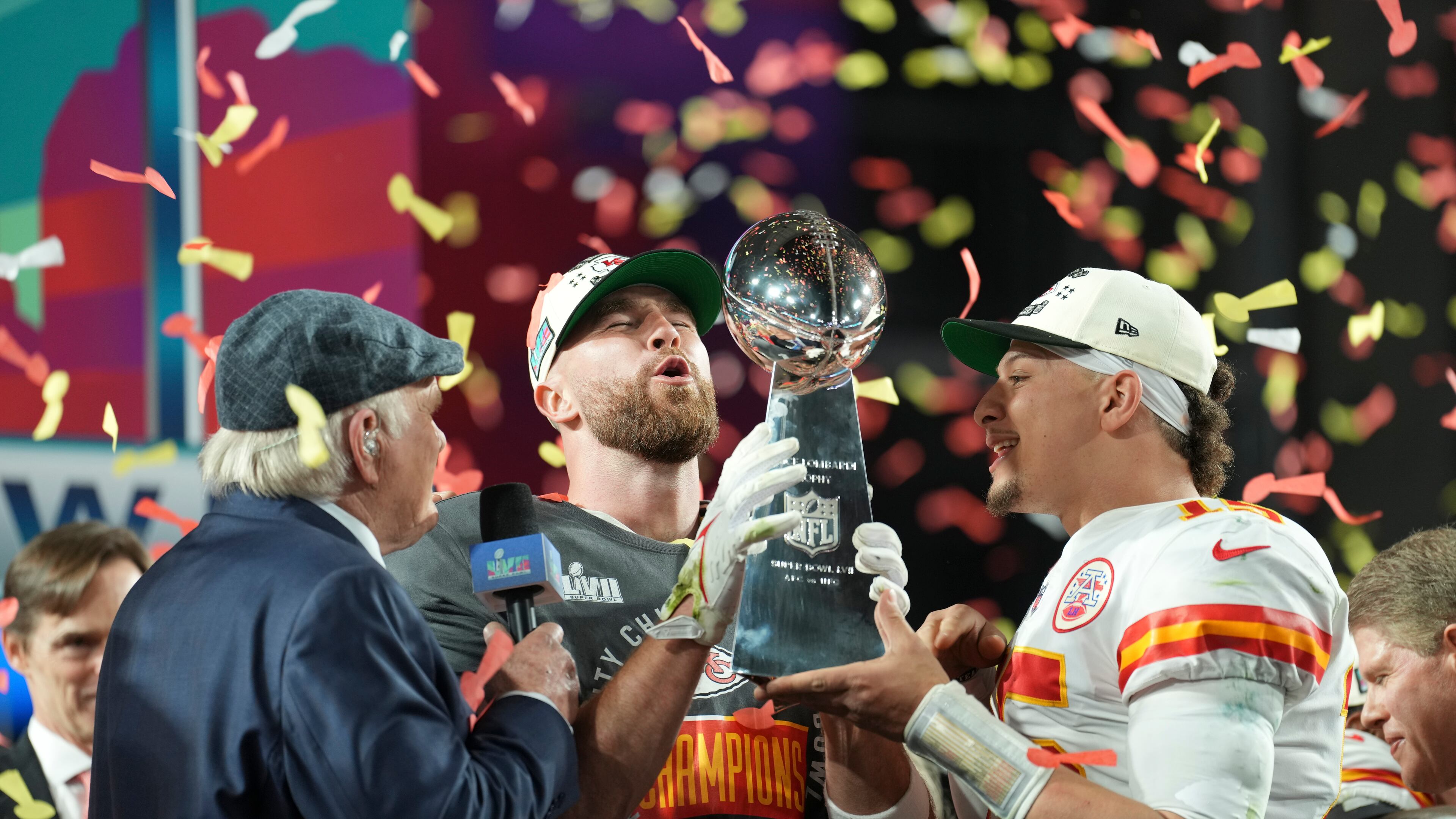 Kansas City Chiefs players Travis Kelce and Patrick Mahomes celebrate with the trophy after winning the Super Bowl LVII against Philadelphia Eagles at State Farm Stadium in Glendale, Ariz., on Feb. 12, 2023. (Doug Mills/The New York Times