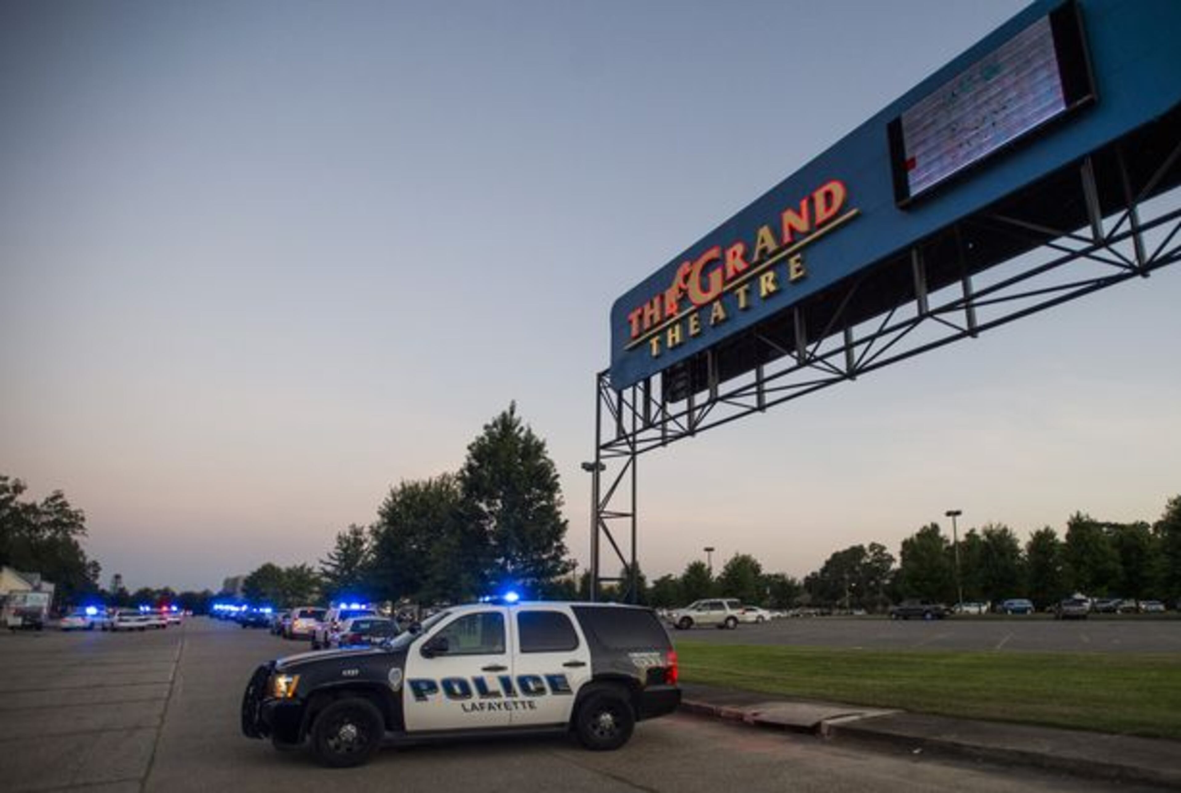 Police surround the scene following a shooting at a movie theater Thursday, July 23, 2015, in Lafayette, La. (AP)