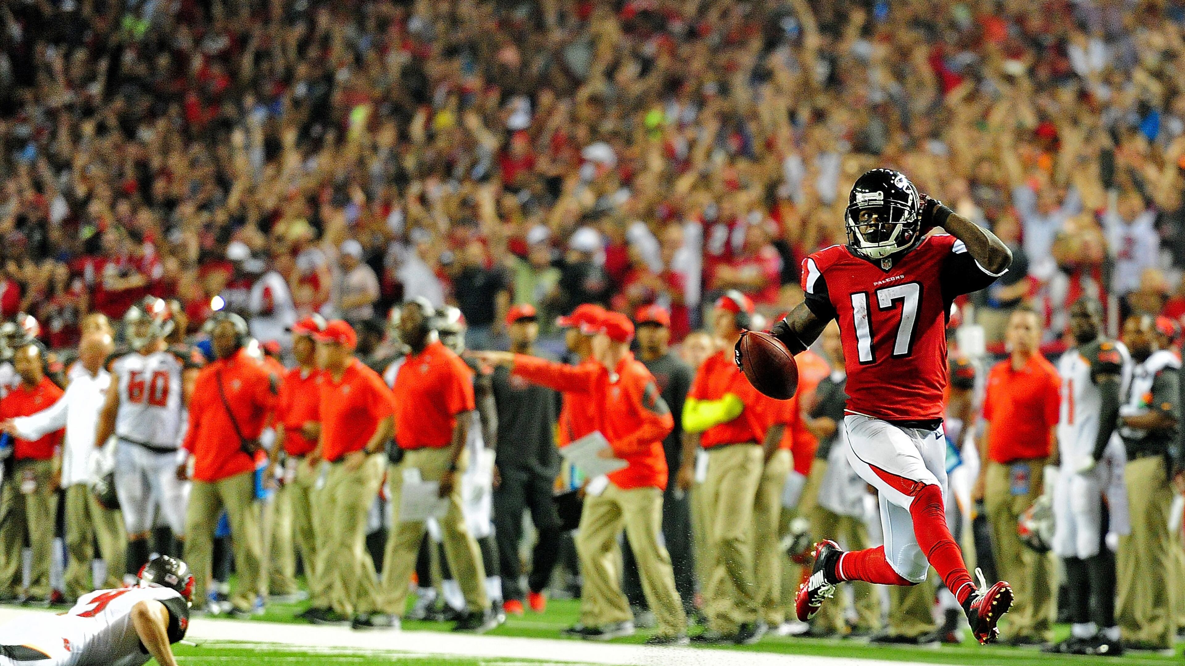 ATLANTA, GA - SEPTEMBER 18: Wide receiver Devin Hester #17 of the Atlanta Falcons returns a punt for a touchdown against the Tampa Bay Buccaneers during a game at the Georgia Dome on September 18, 2014 in Atlanta, Georgia. (Photo by Scott Cunningham/Getty Images)
