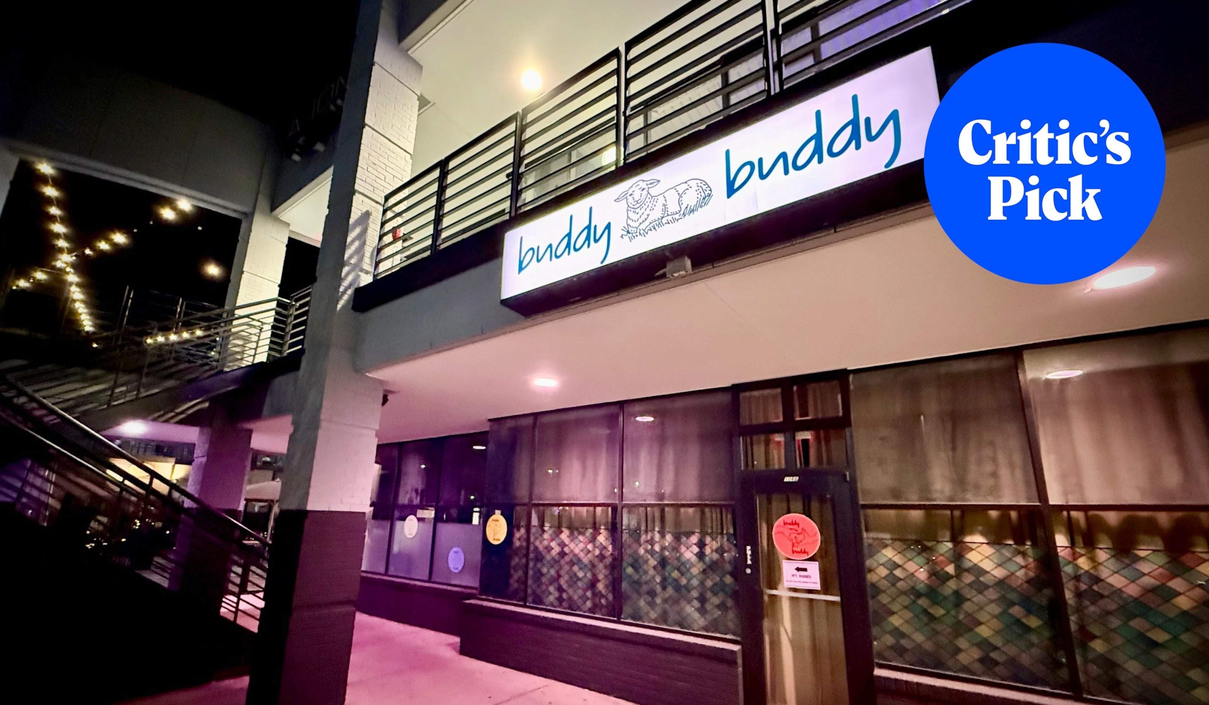 The exterior of Buddy Buddy at the Midtown Promenade development on Monroe Drive. (Henri Hollis/AJC)