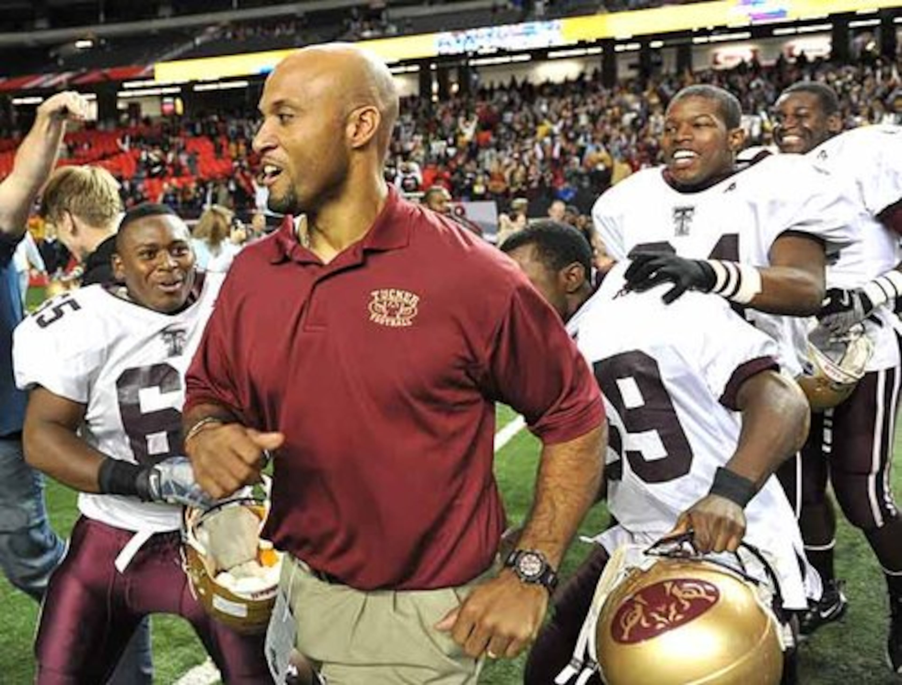 Tucker football coach Franklin Stephens celebrates his team's 15-3 win over Marist in their state Class 4A championship game. Under Stephens, Tucker went 64-6 with two state titles in his five seasons. (AJC 2008)