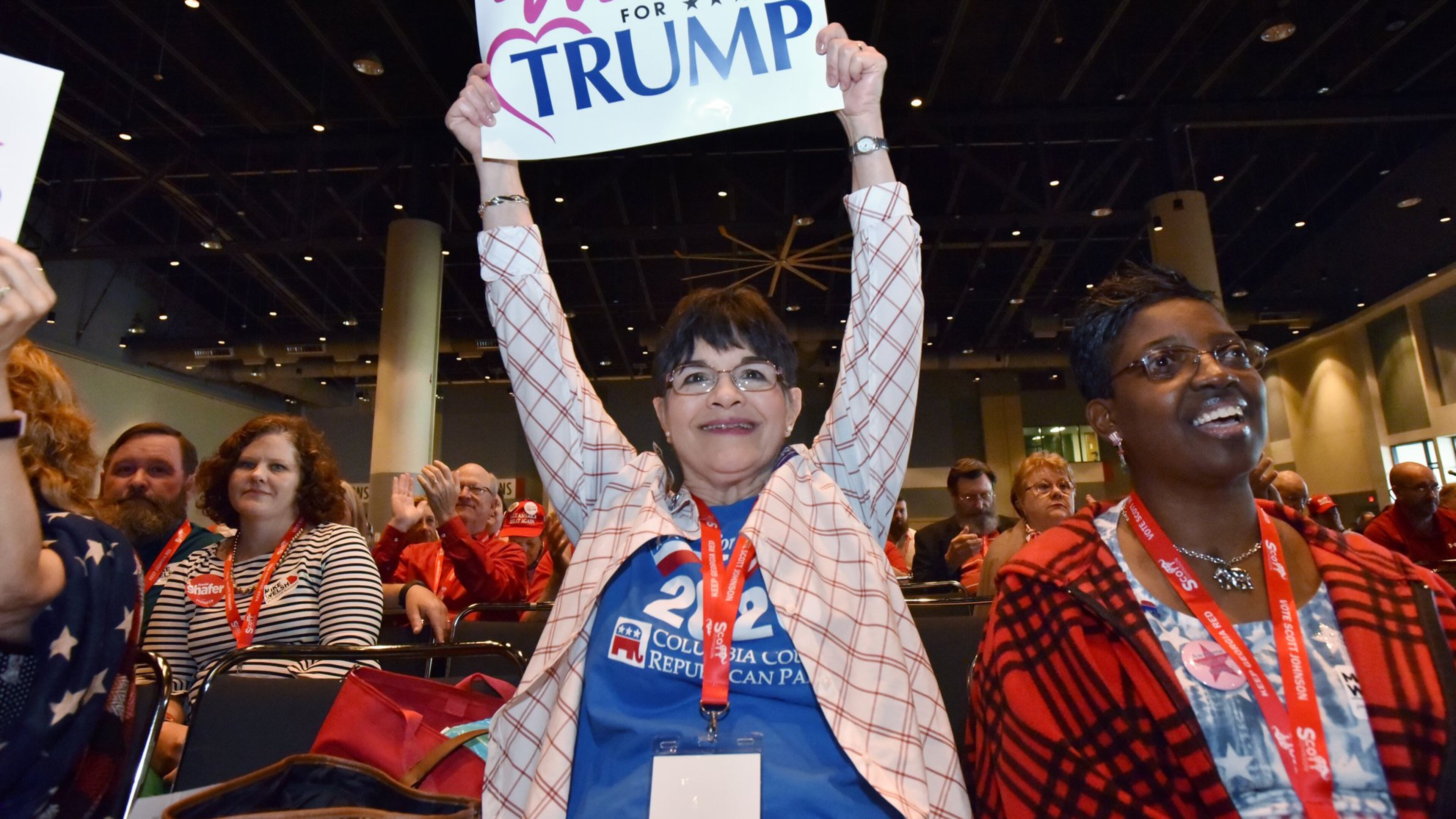 Priscilla Bence holds a sign to support during 2019 Georgia GOP state convention in Savannah. HYOSUB SHIN / HSHIN@AJC.COM