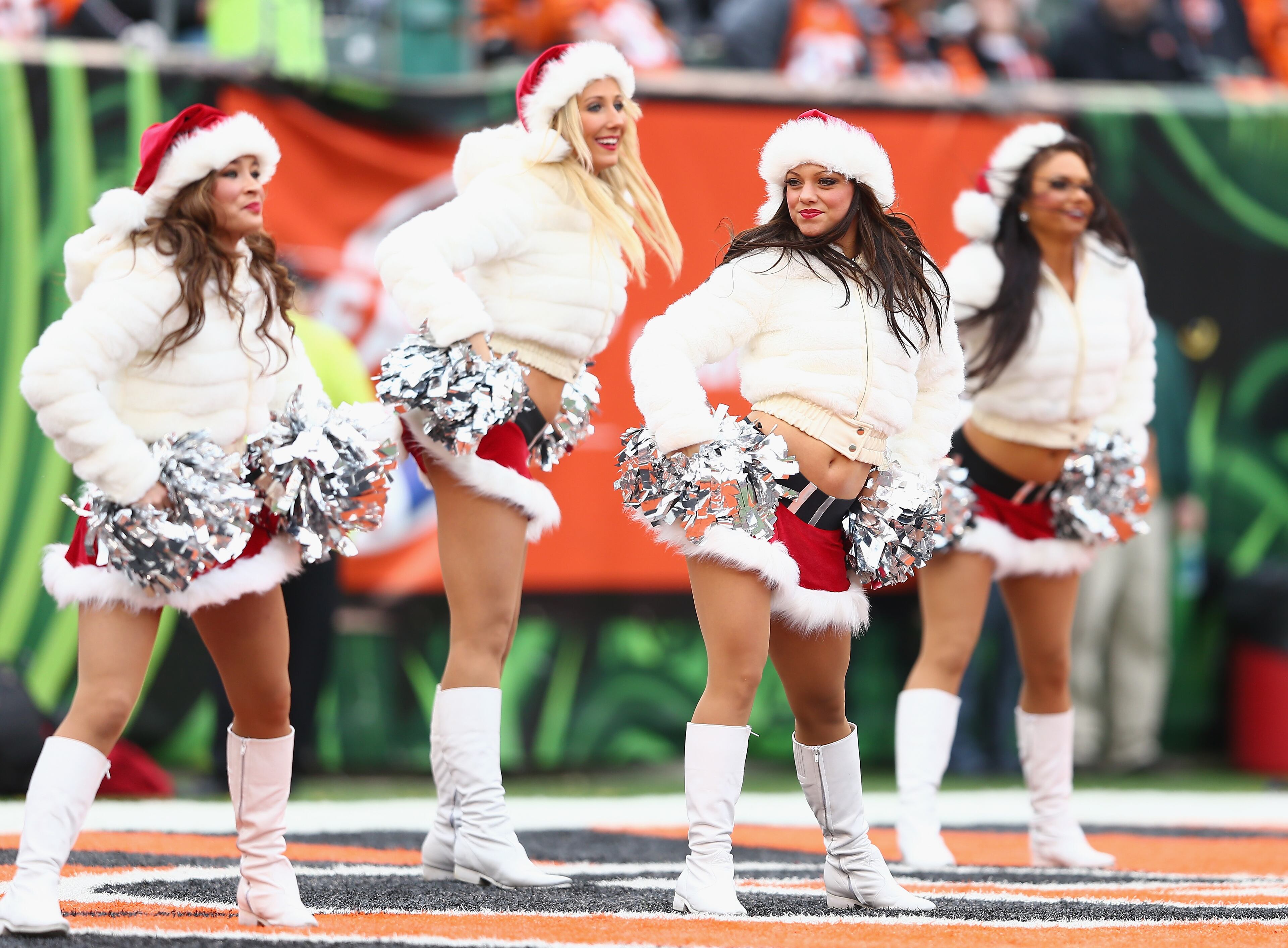 The Cincinnati Bengals cheerleaders perform during the NFL game against the Minnesota Vikings at Paul Brown Stadium on Dec. 22, 2013 in Cincinnati, Ohio. (Photo by Andy Lyons/Getty Images)