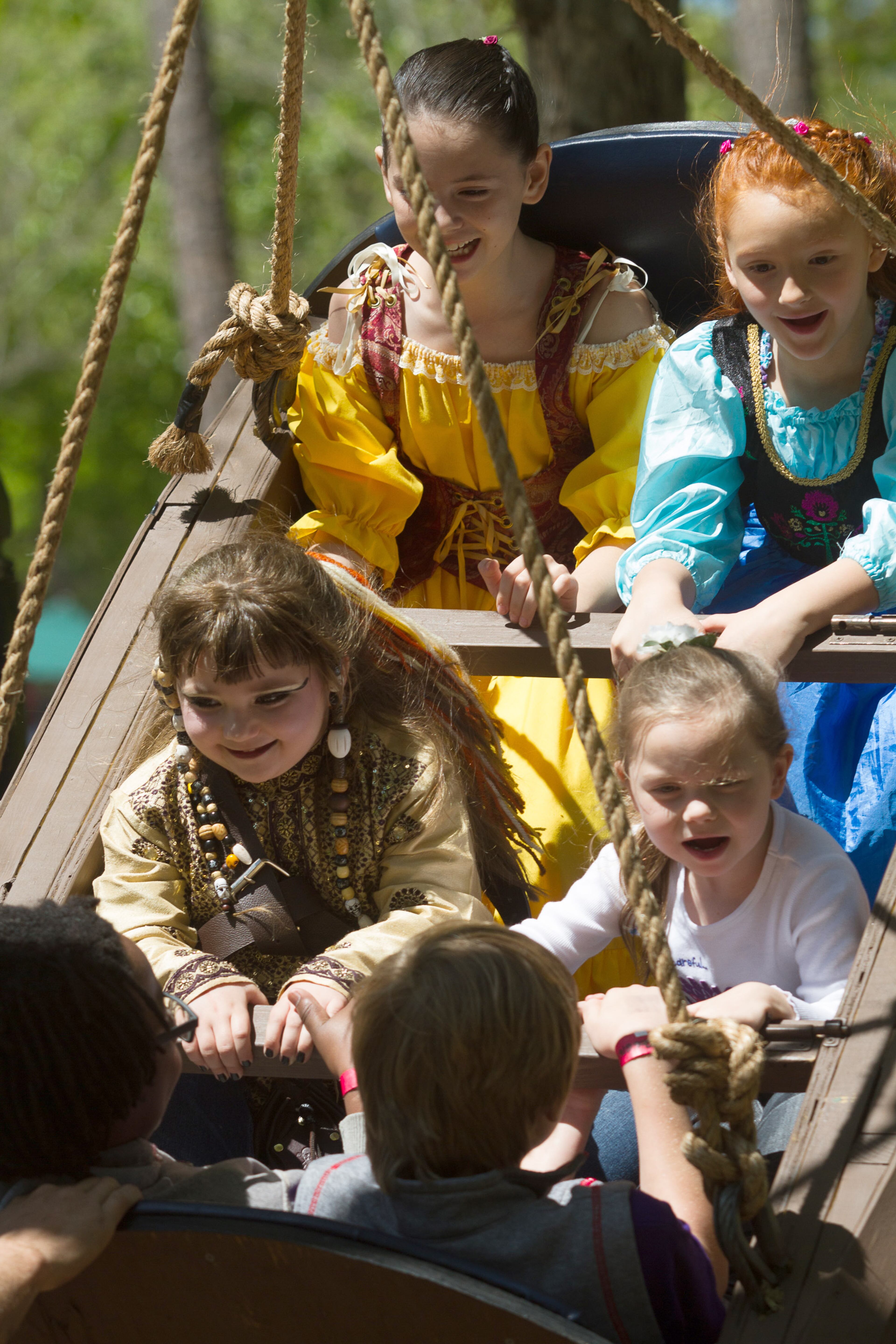 Kids ride the Barrel of Bedlam ride during the Georgia Renaissance Festival in Fairburn, Ga. Saturday April 16, 2016. STEVE SCHAEFER / SPECIAL TO THE AJC