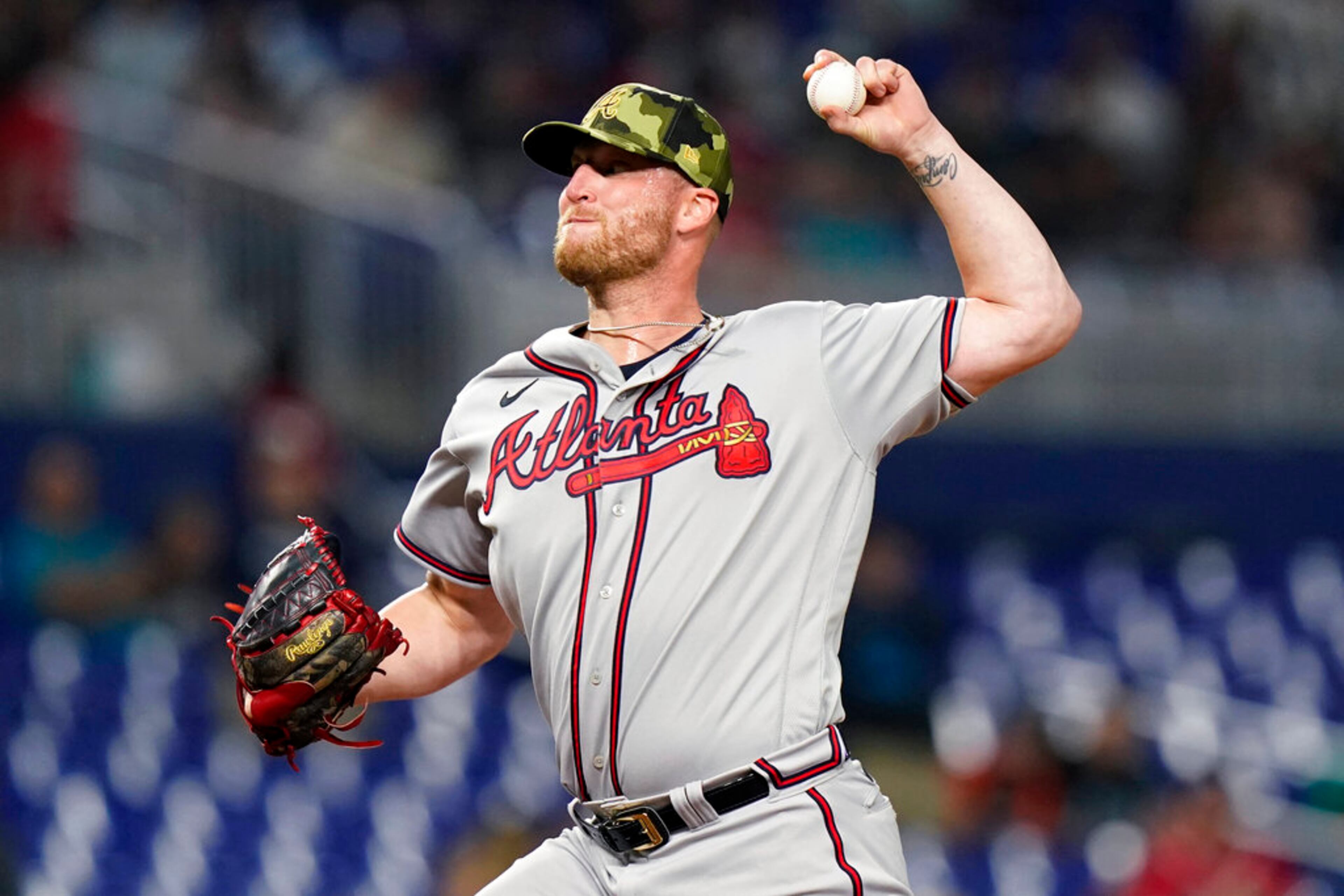 Atlanta Braves relief pitcher Will Smith throws during the ninth inning of the team's baseball game against the Miami Marlins, Friday, May 20, 2022, in Miami. The Braves won 5-3. (AP Photo/Lynne Sladky)