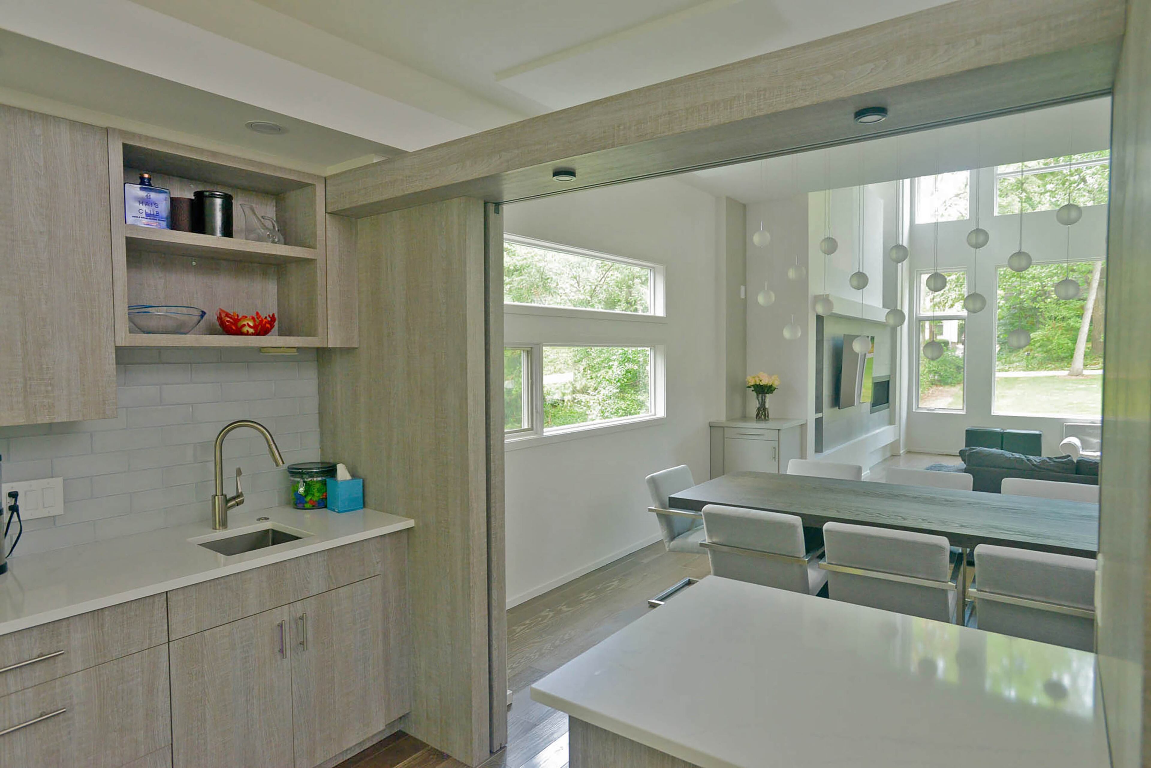 Architect Steve Robinson said the two sliding "barn" doors between the kitchen and the dining room are a unique touch in the home. When both are closed, they form a wall separating the spaces.