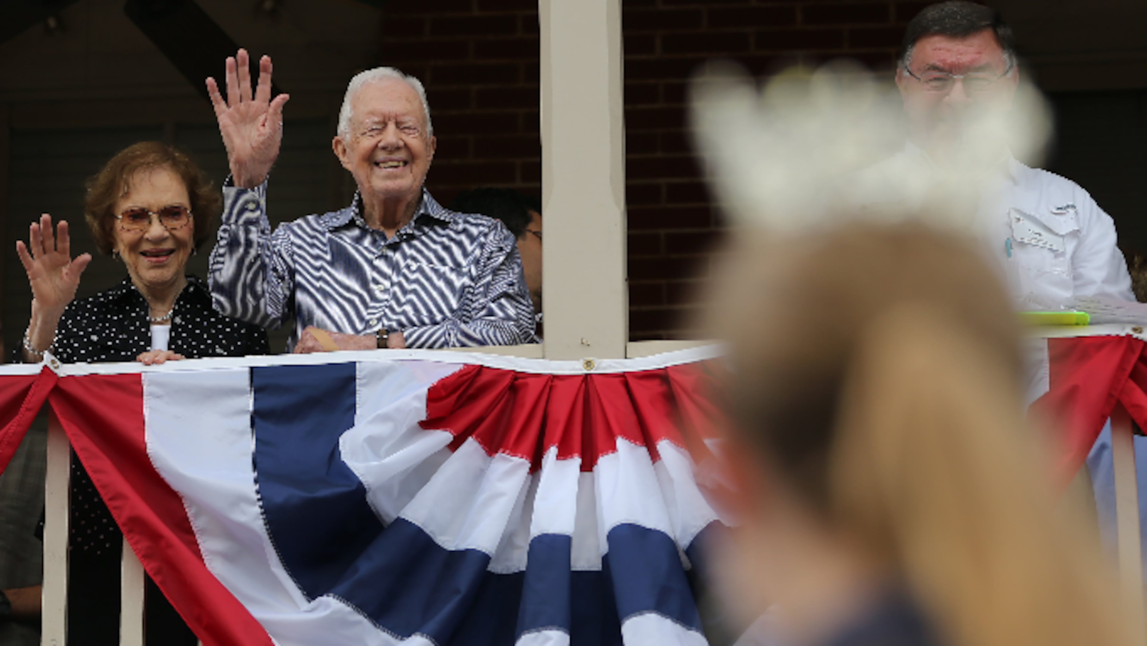 Former President Jimmy Carter and First Lady Rosalynn Carter wave to a beauty queen during the Peanut Festival on Saturday September 26, 2015 in Plains. Much of Plains is within the Jimmy Carter National Historic Site and Preservation District run by the National Park Service, which is making Carter an honorary national park ranger on Sunday. Ben Gray / bgray@ajc.com