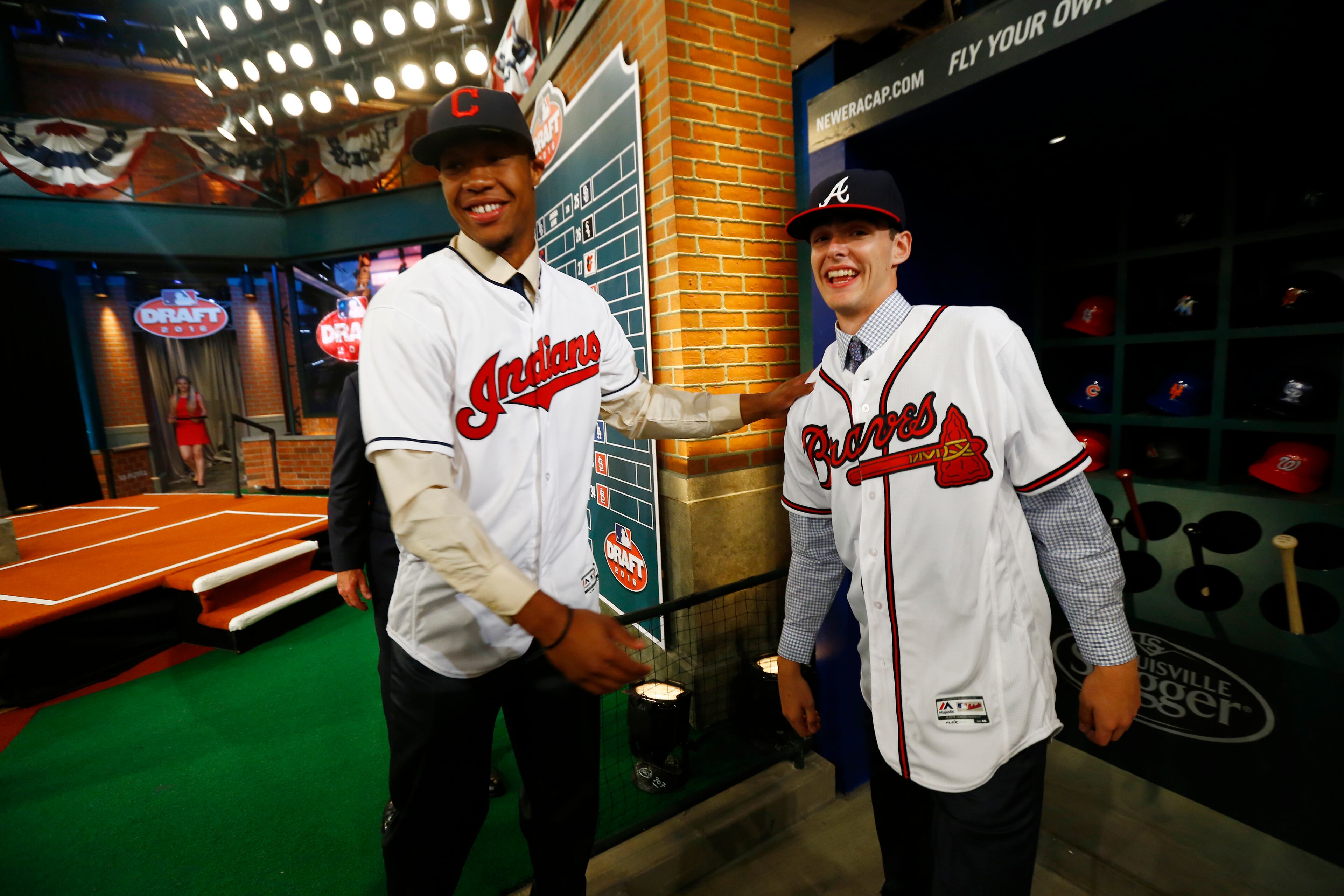Will Benson, left, an outfielder from The Westminster Schools in Atlanta, talks to Ian Anderson, a pitcher from Shenendehowa High School in Clifton Park, N.Y., after Benson was drafted No. 14 by the Cleveland Indians in the first round of the Major League Baseball draft, Thursday, June 9, 2016, in Secaucus, N.J. Anderson was drafted No. 3 by the Atlanta Braves. (AP Photo/Julio Cortez)