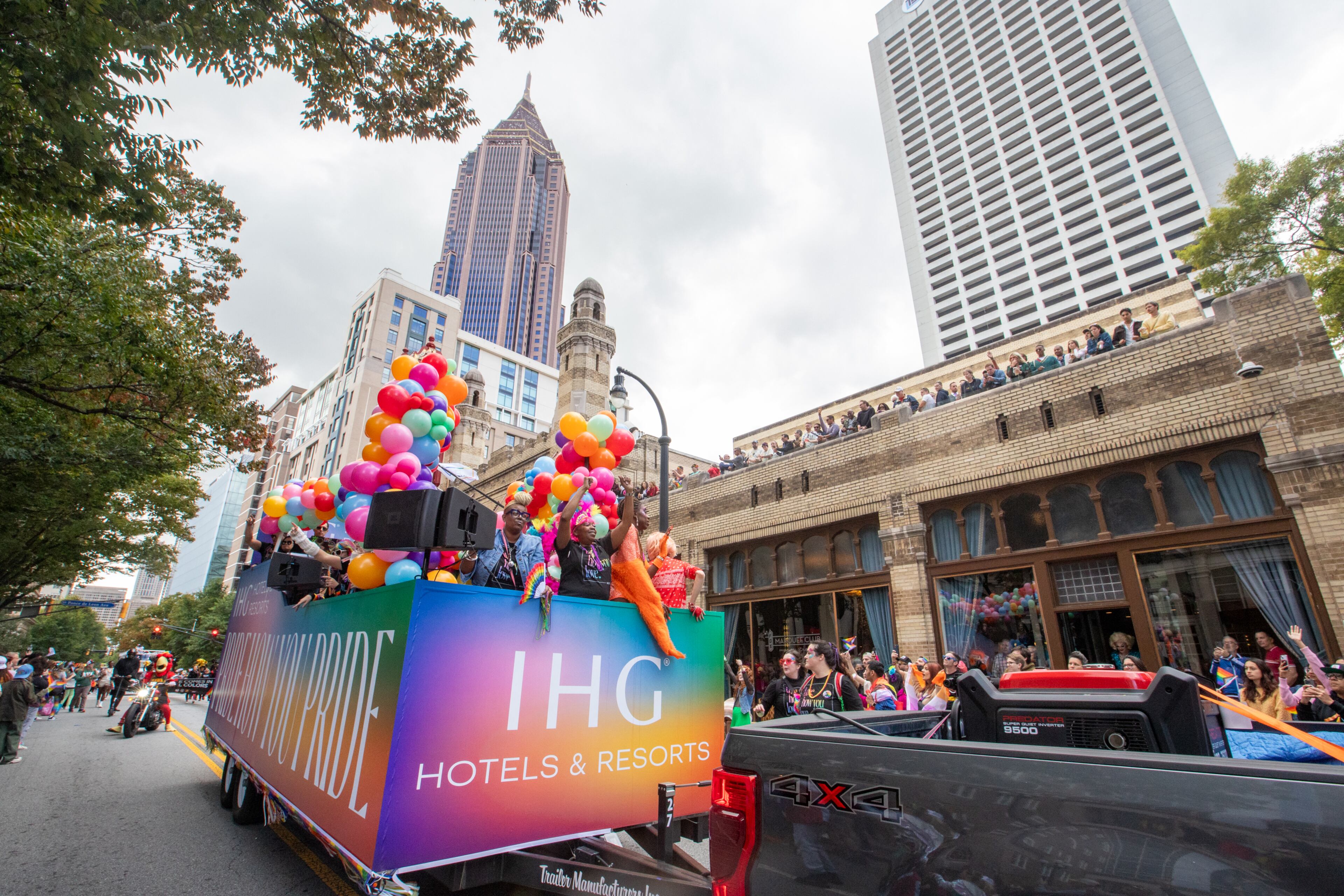 The annual Pride Parade runs up Peachtree Street to 10th Street and into Piedmont Park in Atlanta on Sunday, Oct 15, 2023. (Jenni Girtman for The Atlanta Journal-Constitution)