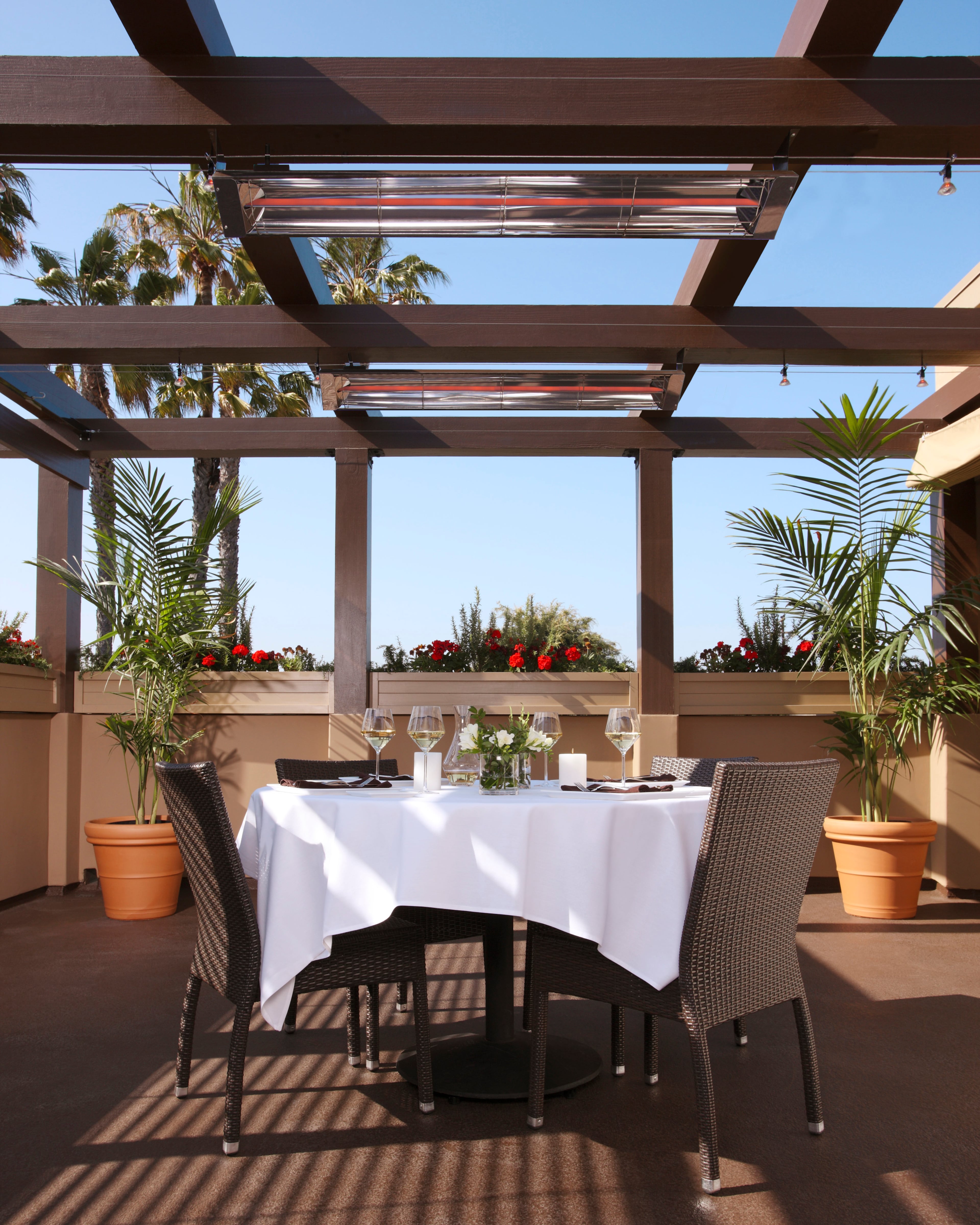 Infratech's electric infrared heater, available at Authenteak, can be mounted on walls, poles or beams, tucked up under a canvas or awnings, and built into a ceiling or roof.