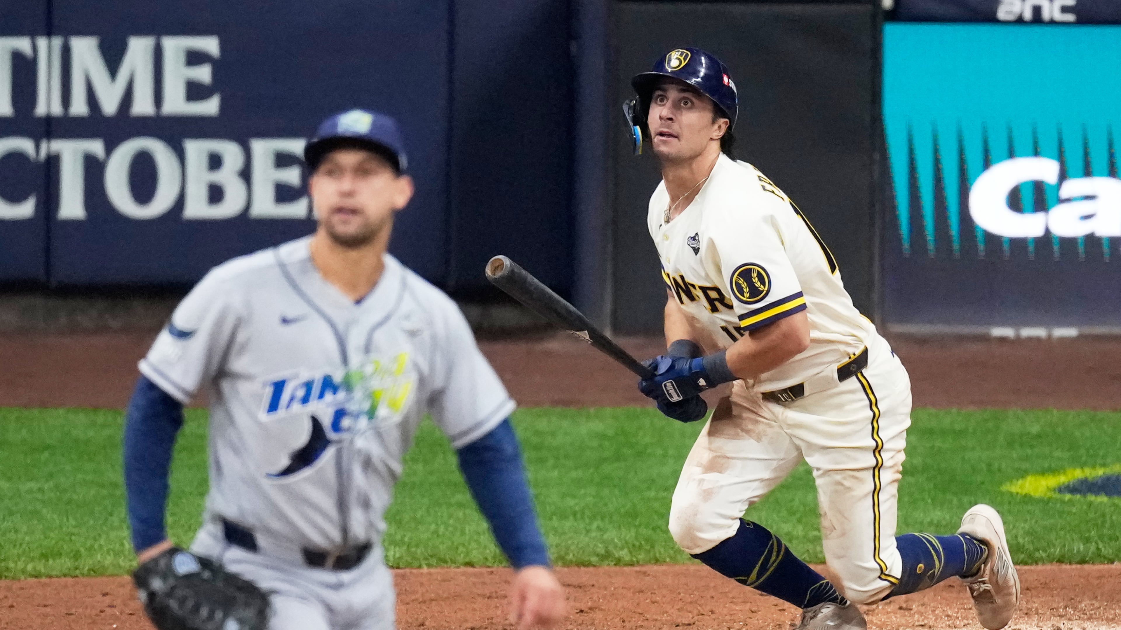 Milwaukee Brewers' Sal Frelick watches his home run during the sixth inning of Game 2 of baseball's World Series, Saturday, Oct. 24, 2026, in Milwaukee, between the Milwaukee Brewers and the Tampa Bay Rays. (AP Photo/David J. Phillip)