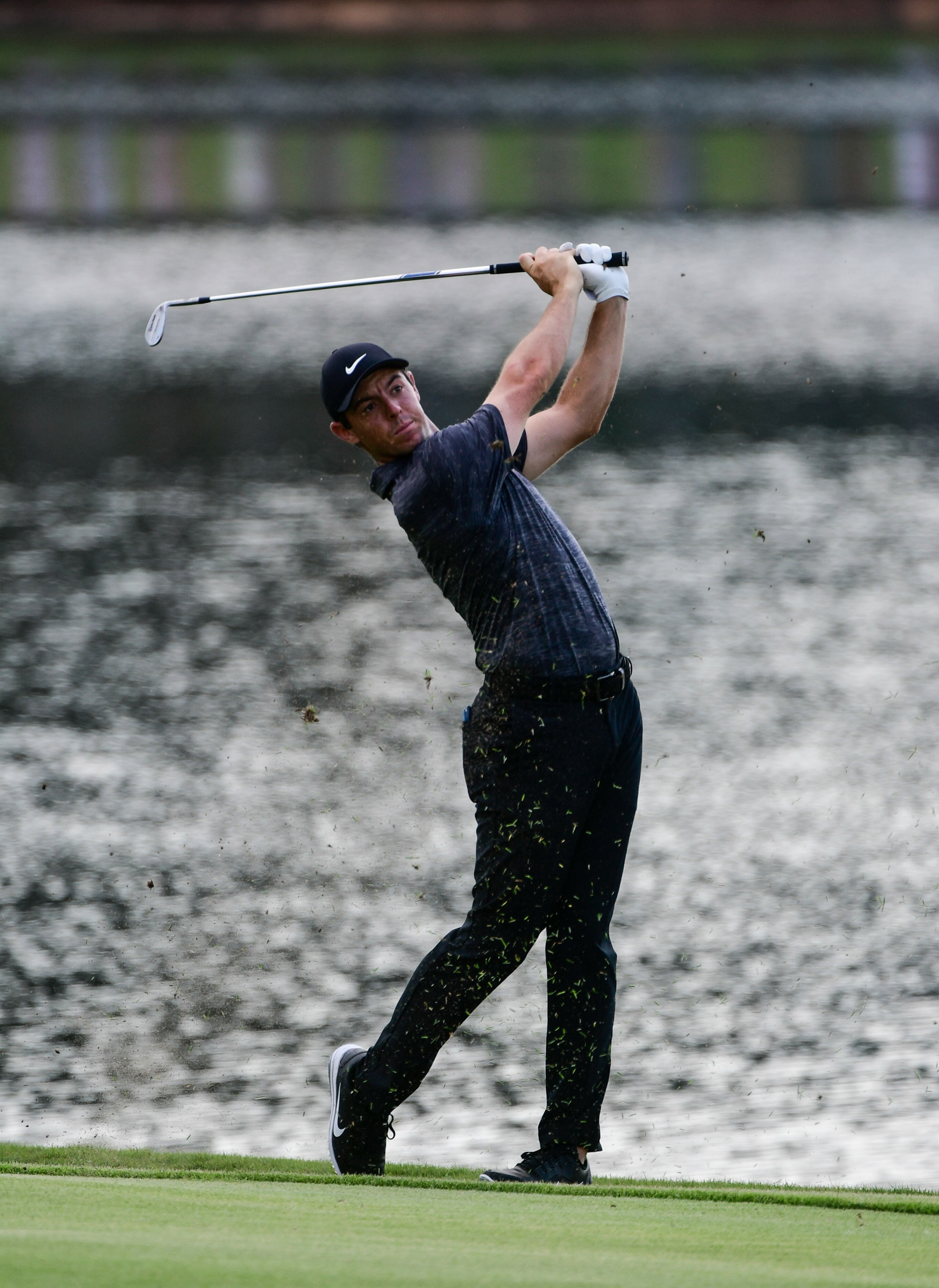 Rory McIlroy hits from the 7th fairway during the third round of the Tour Championship golf tournament Saturday, Sept. 22, 2018, in Atlanta. (AP Photo/John Amis)