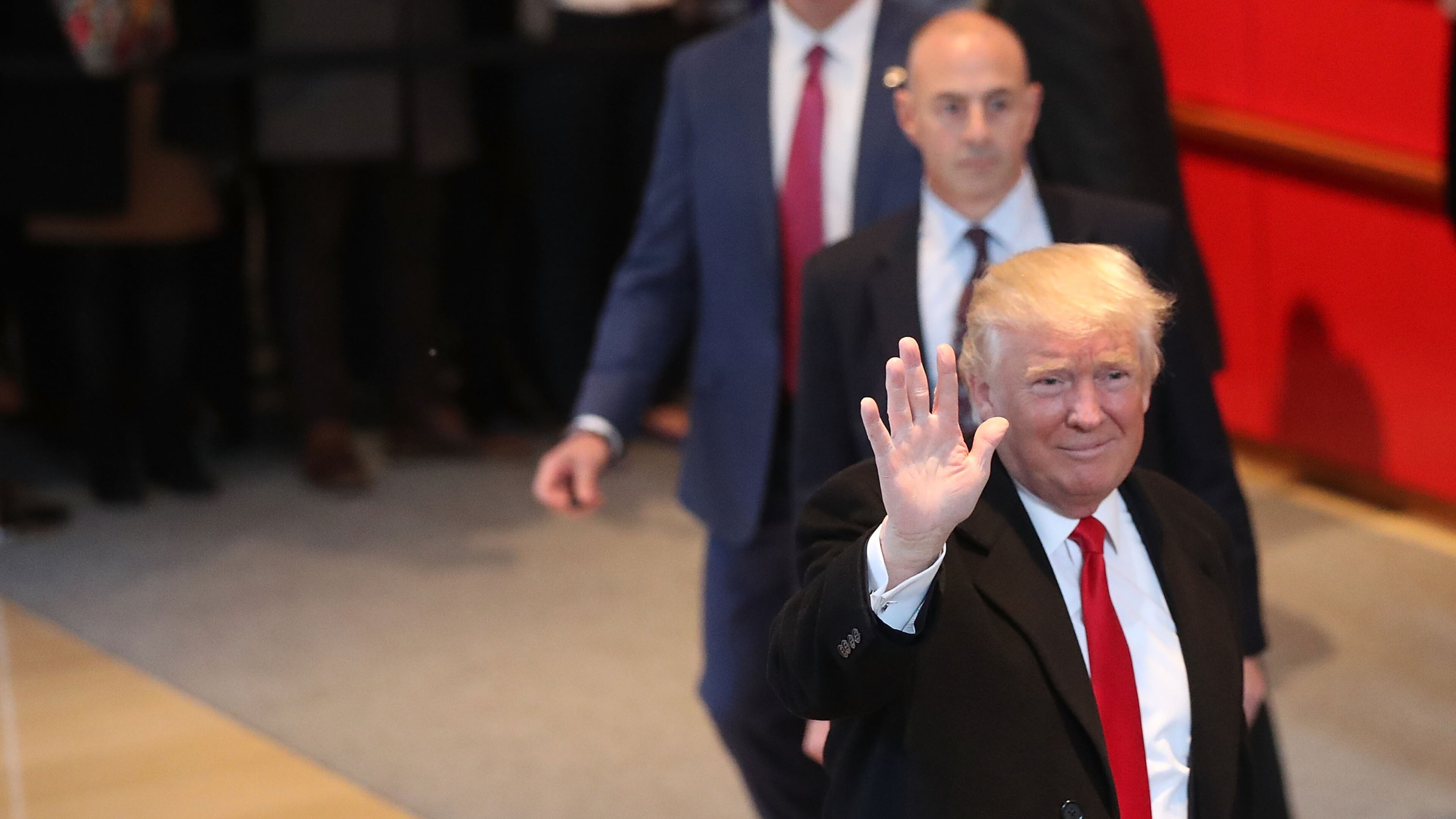 NEW YORK, NY - NOVEMBER 22: President-elect Donald Trump walks through the lobby of the New York Times following a meeting with editors at the paper on November 22, 2016 in New York City. (Photo by Spencer Platt/Getty Images)