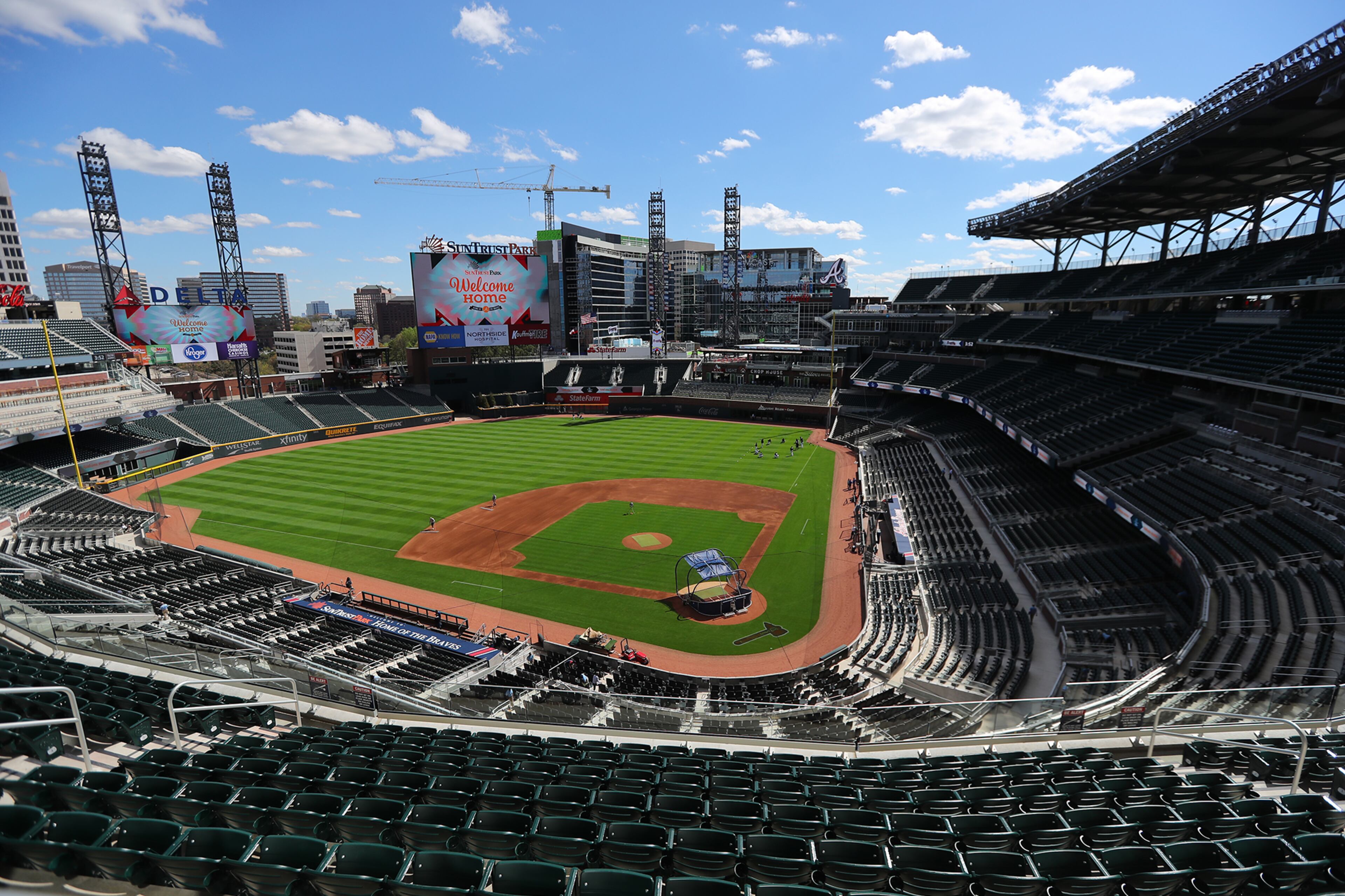 March 31, 2017, Atlanta: Braves players begin to warm up for their MLB exhibition game against the N.Y. Yankees for the soft opening of SunTrust Park on Friday, March 31, 2017, in Atlanta. Curtis Compton/ccompton@ajc.com