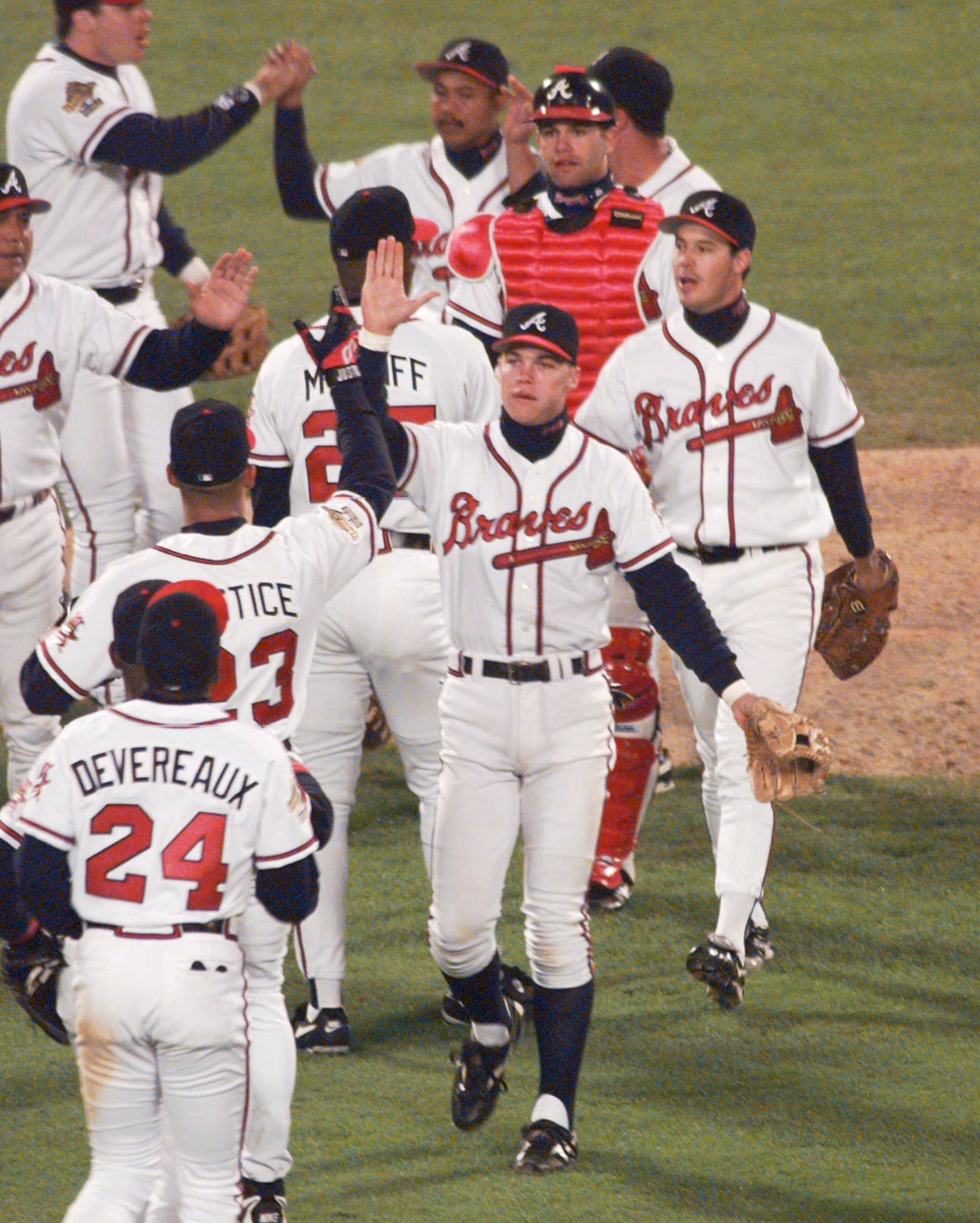 OCTOBER 21, 1995 ATLANTA The Atlanta Braves celebrate after beating the Cleveland Indians 3-2 in Game 1 at the World Series in Atlanta, Saturday, Oct. 21, 1995. The Braves take a 1-0 lead in the best-of-seven series. (AP Photo/Hans Deryk)
