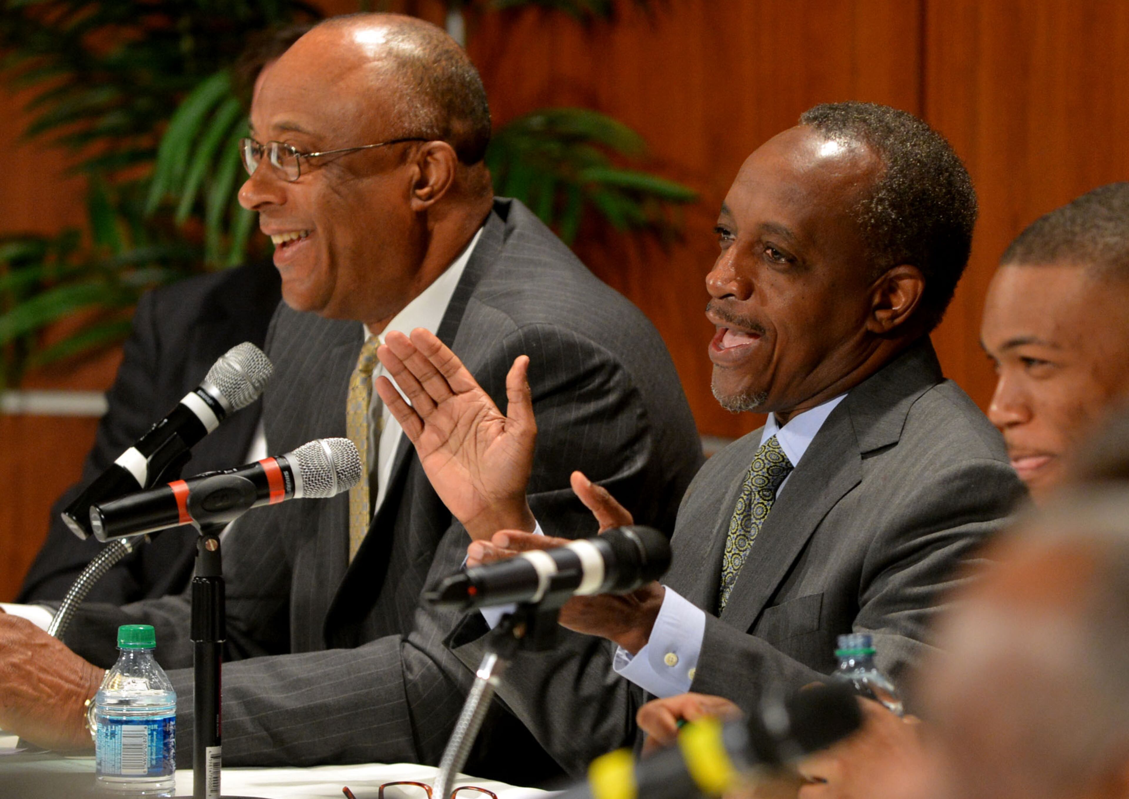 Superintendent Michael Thurmond applauds as the board gets the word the district is off probation. The Southern Association of Colleges and Schools has cleared the DeKalb school district from its probationary status saying the threat to its accreditation is no longer eminent. Dr Mark Elgart, CEO of AdvancED made the presentation before the Dekalb County School Board and a standing room only crowd Tuesday, January 21, 2014. However, Elgart, the SACS chief, says the district is still under watch and they are now under something called accreditation warning. Gov. Nathan Deal was also there to applaud the school district on its progress. Deal removed six board members last year after the district was placed on probation for mismanagement. KENT D. JOHNSON/KDJOHNSON@AJC.COM