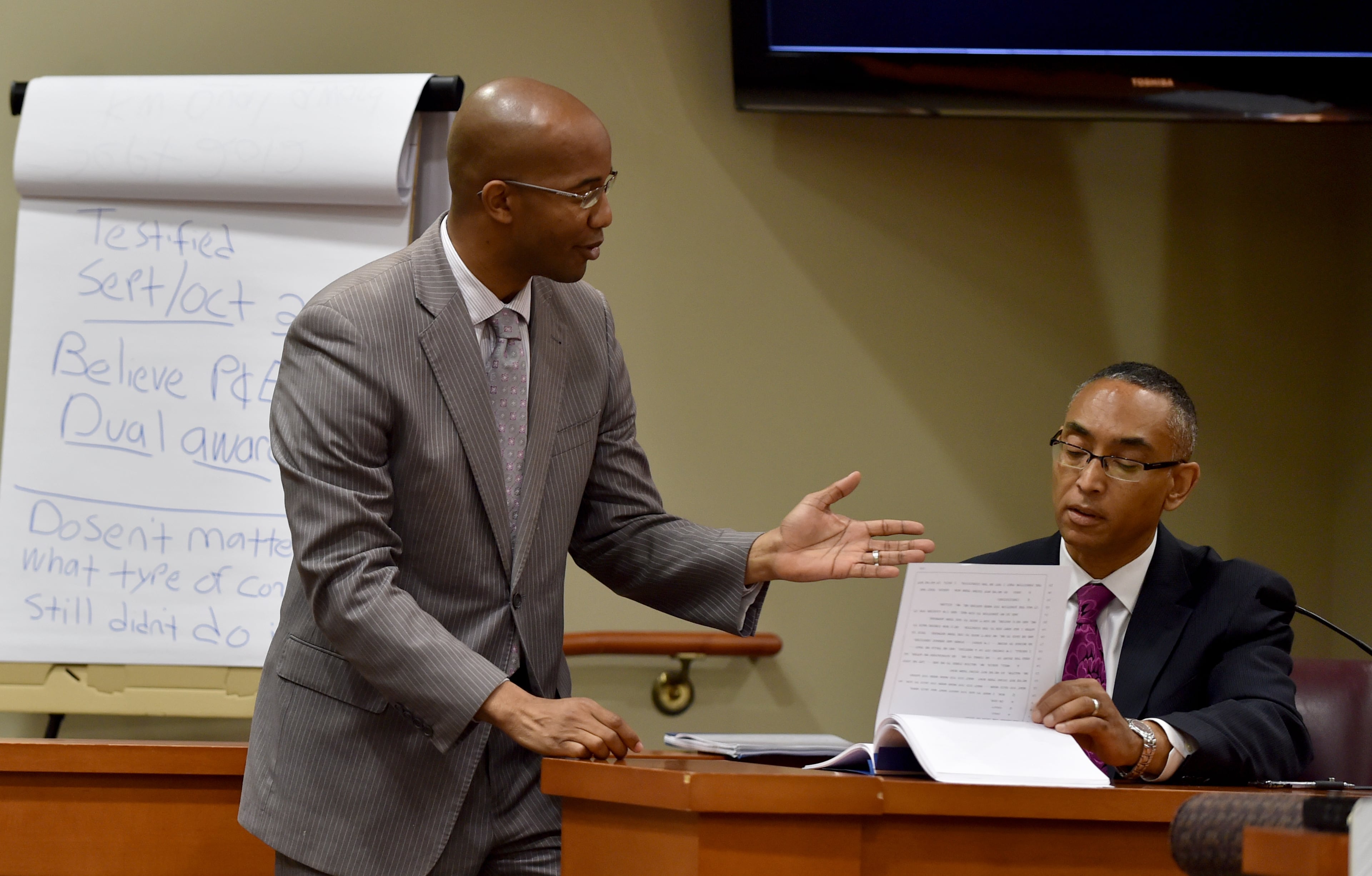 DeKalb District Attorney Robert James (shown during the 2015 Burrell Ellis retrial) has handled numerous prosecutions of county officials, including the following: Former DeKalb CEO Burrell Ellis and former schools Superintendent Crawford Lewis, who pleaded guilty to misdemeanor obstruction under a deal with prosecutors. A jury also found former DeKalb schools Chief Operating Officer Pat Reid and architect Tony Pope guilty in November 2013 for their involvement in a school construction scandal. -- Text by AJC staff reporters