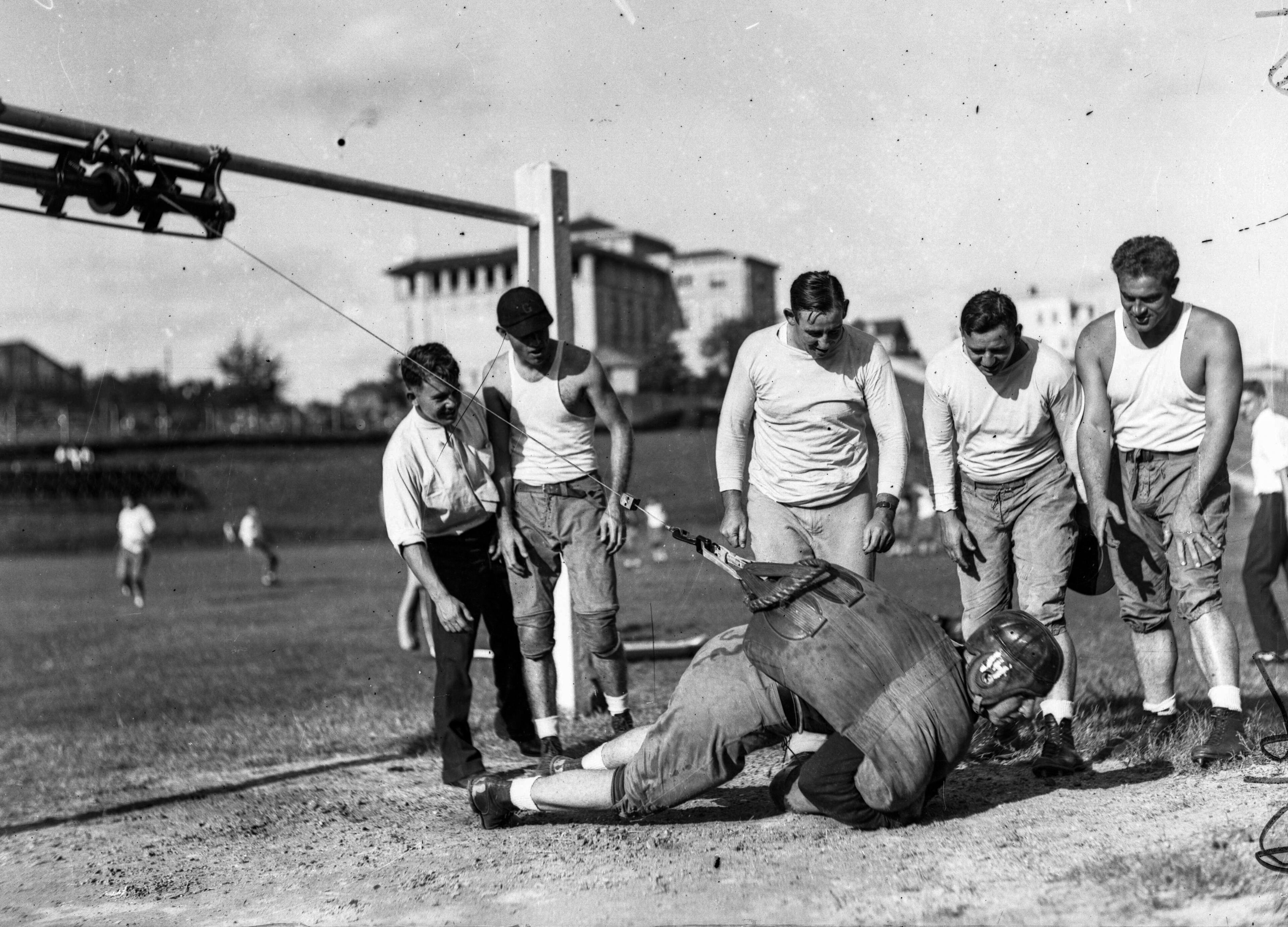 University of Georgia football team practicing, Athens, Georgia, 1933. LBGlass - 031, Lane Brothers Commercial Photographers Photographic Collection, 1920-1976. Photographic Collection, Special Collections and Archives, Georgia State University Library.