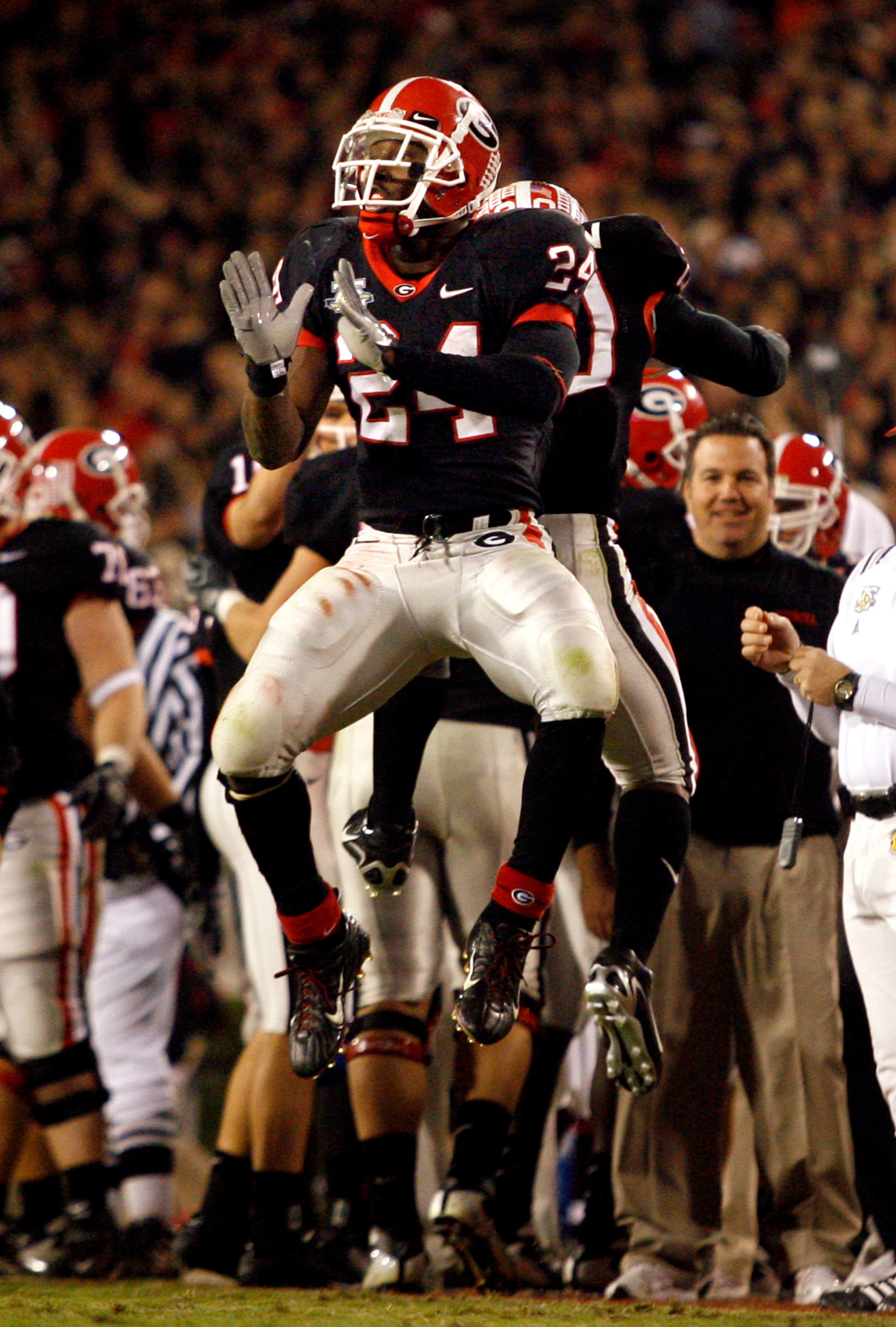Georgia tailback Knowshon Moreno (24) celebrates a touchdown with teammate Thomas Brown (20) during the Bulldogs 45-20 win over Auburn on November 10, 2007 in Athens. (Pouya Dianat/Atlanta Journal-Constitution)