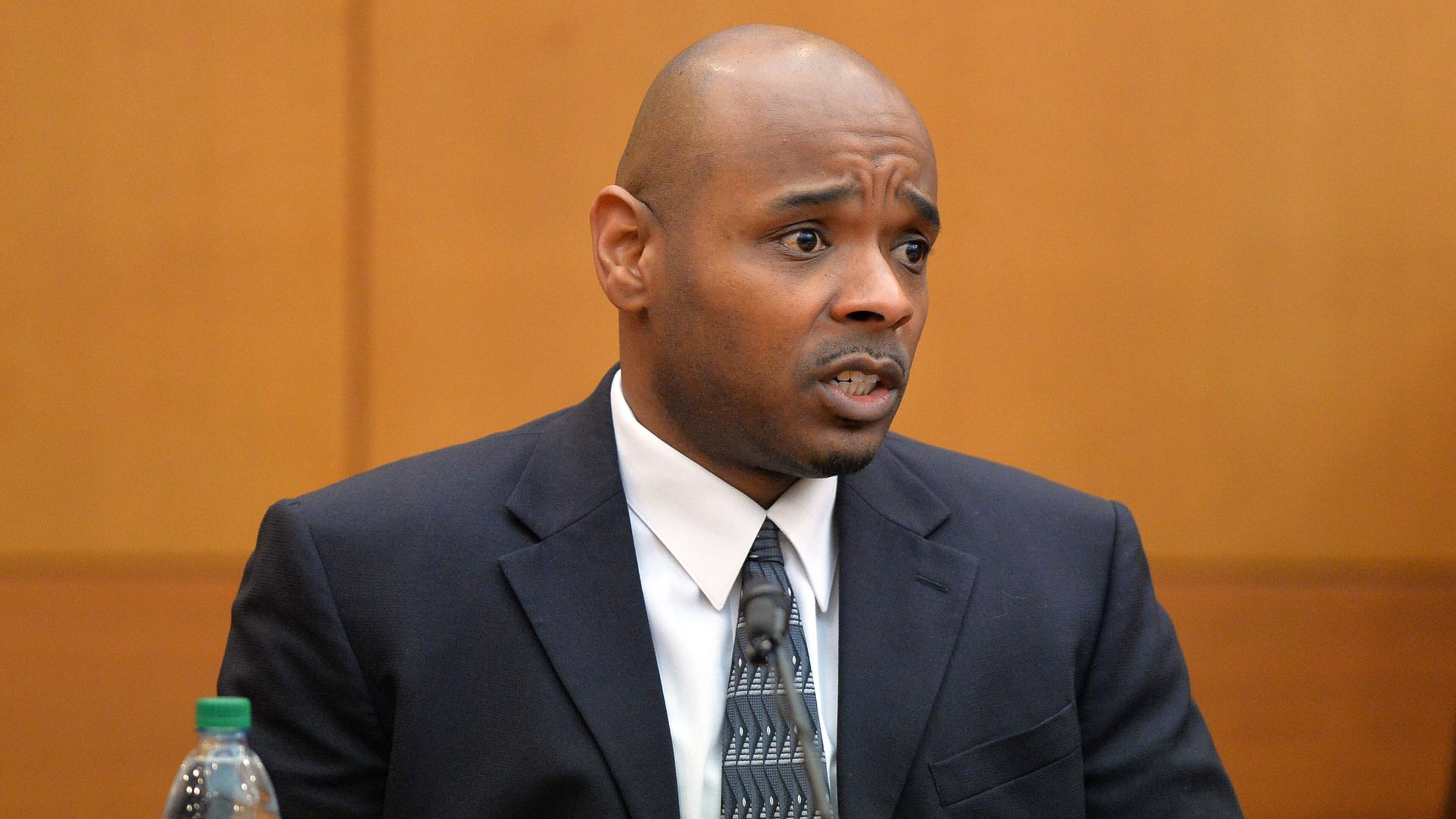 Former Dobbs Elementary School teacher Derrick Broadwater testifies Wednesday in the Atlanta Public Schools test-cheating trial before Judge Jerry Baxter in Fulton County Superior Court. (Kent D. Johnson, The Atlanta Journal-Constitution)