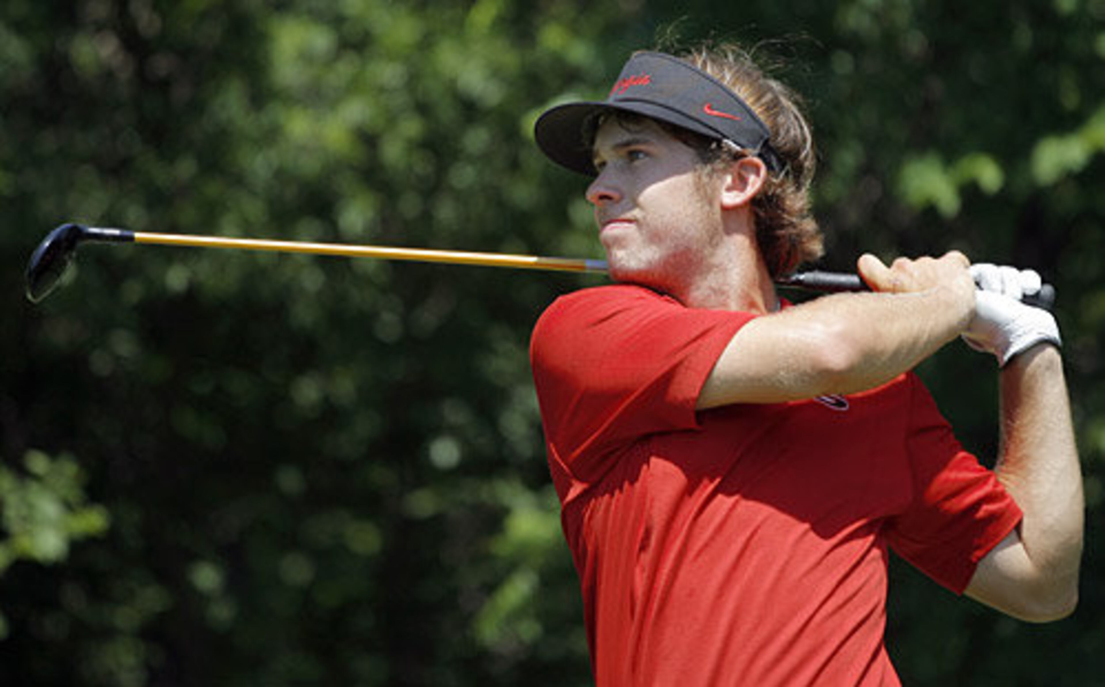 Georgia's Bryden Macpherson watches his tee shot on No. 13.