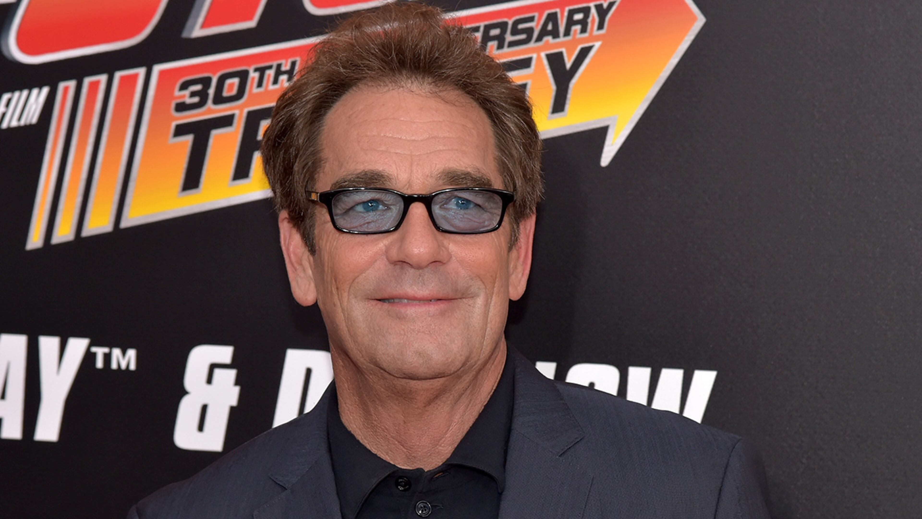 Singer Huey Lewis has canceled 2018 shows because of hearing loss. (Photo by Theo Wargo/Getty Images)