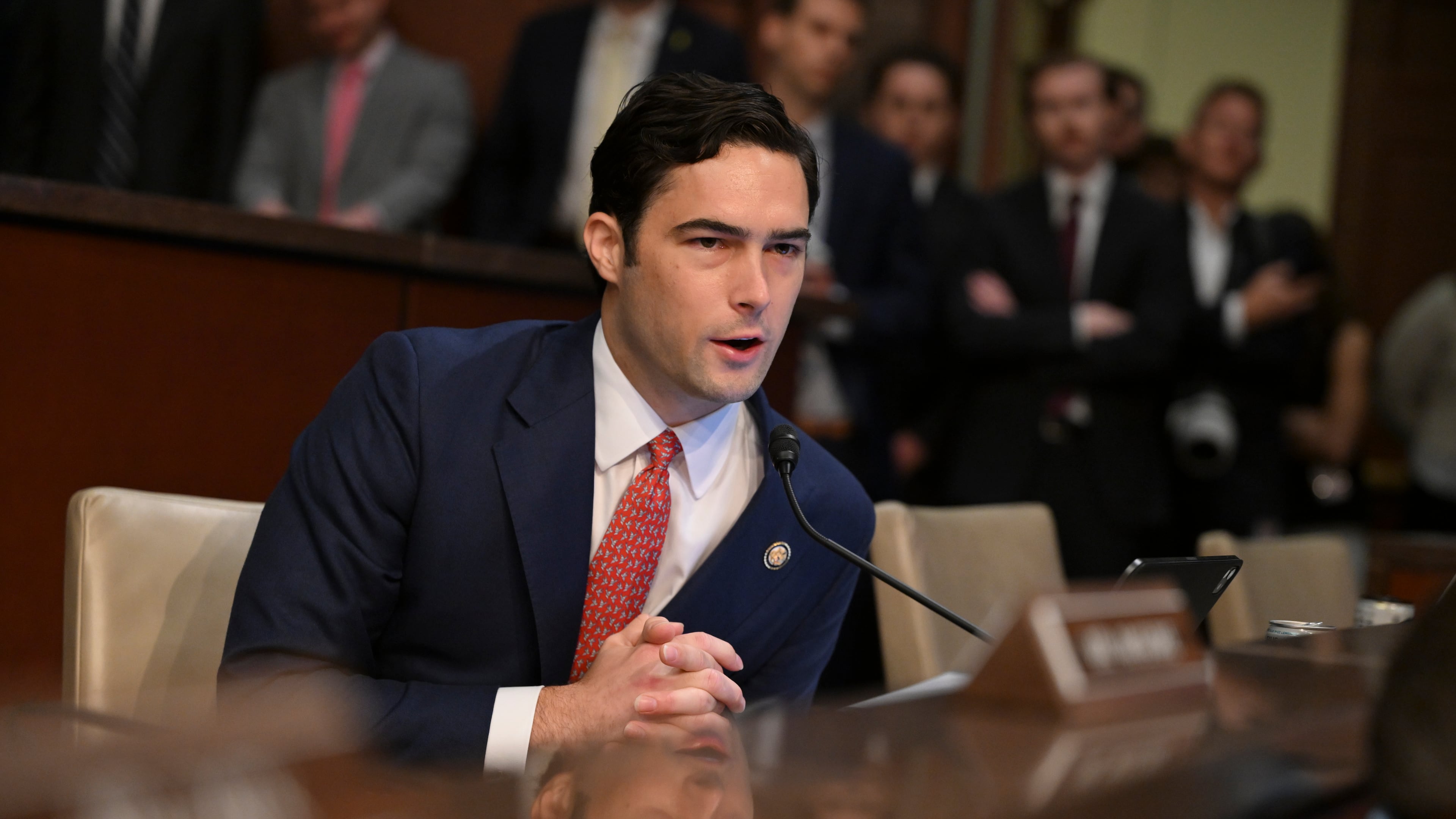 Rep. Brandon Gill (R-Texas) questions Gov. J.B. Pritzker of Illinois during a hearing of the House Committee on Oversight and Government Reform on state immigration policies on Capitol Hill in Washington, on Thursday, June 12, 2025. (Kenny Holston/The New York Times)