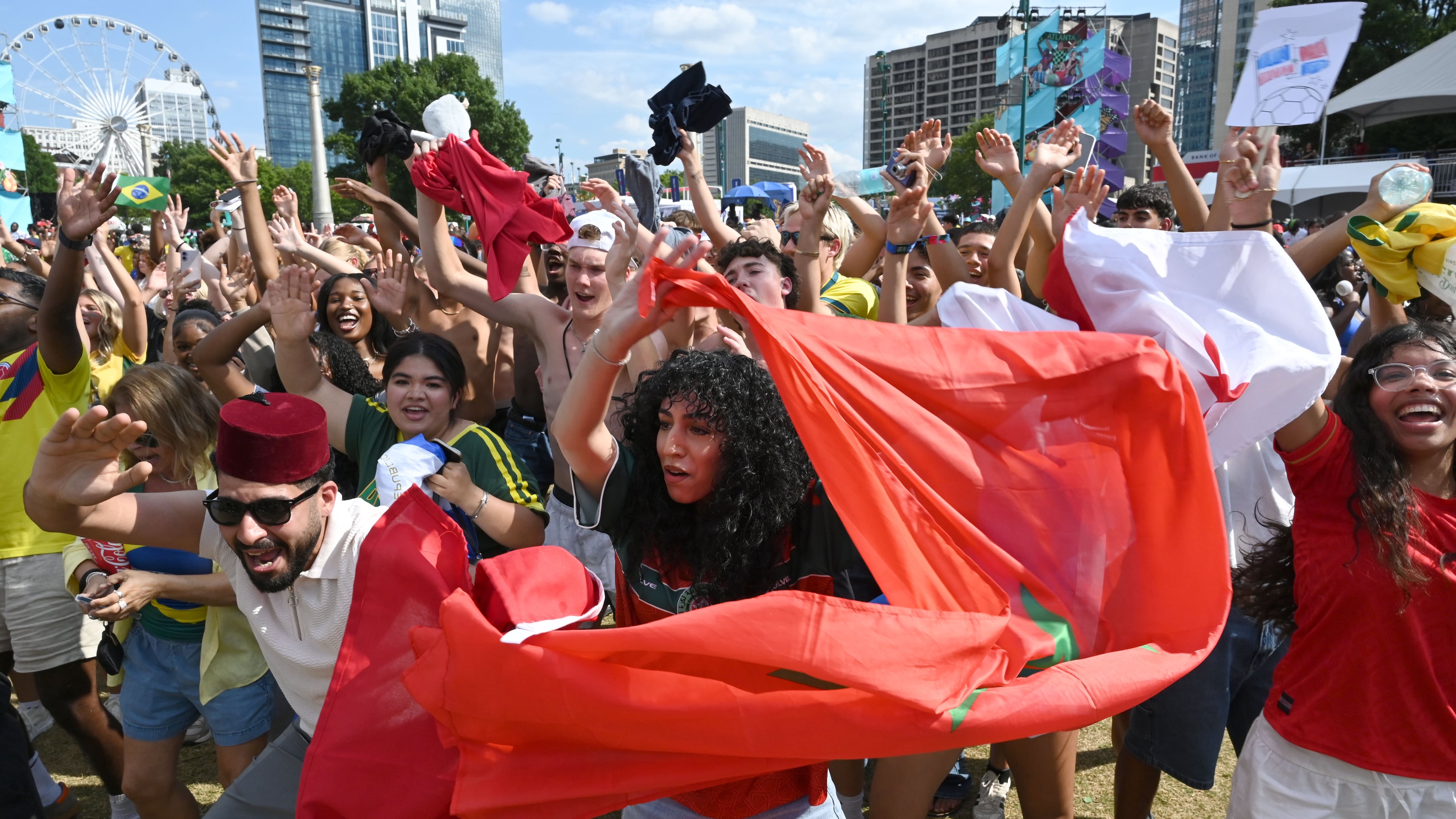 Morocco fans cheer as they gather to watch the match between Morocco vs. Haiti at the FIFA Fan Festival in Centennial Olympic Park on Wednesday, June 24, 2026, in Atlanta. (Hyosub Shin/AJC)