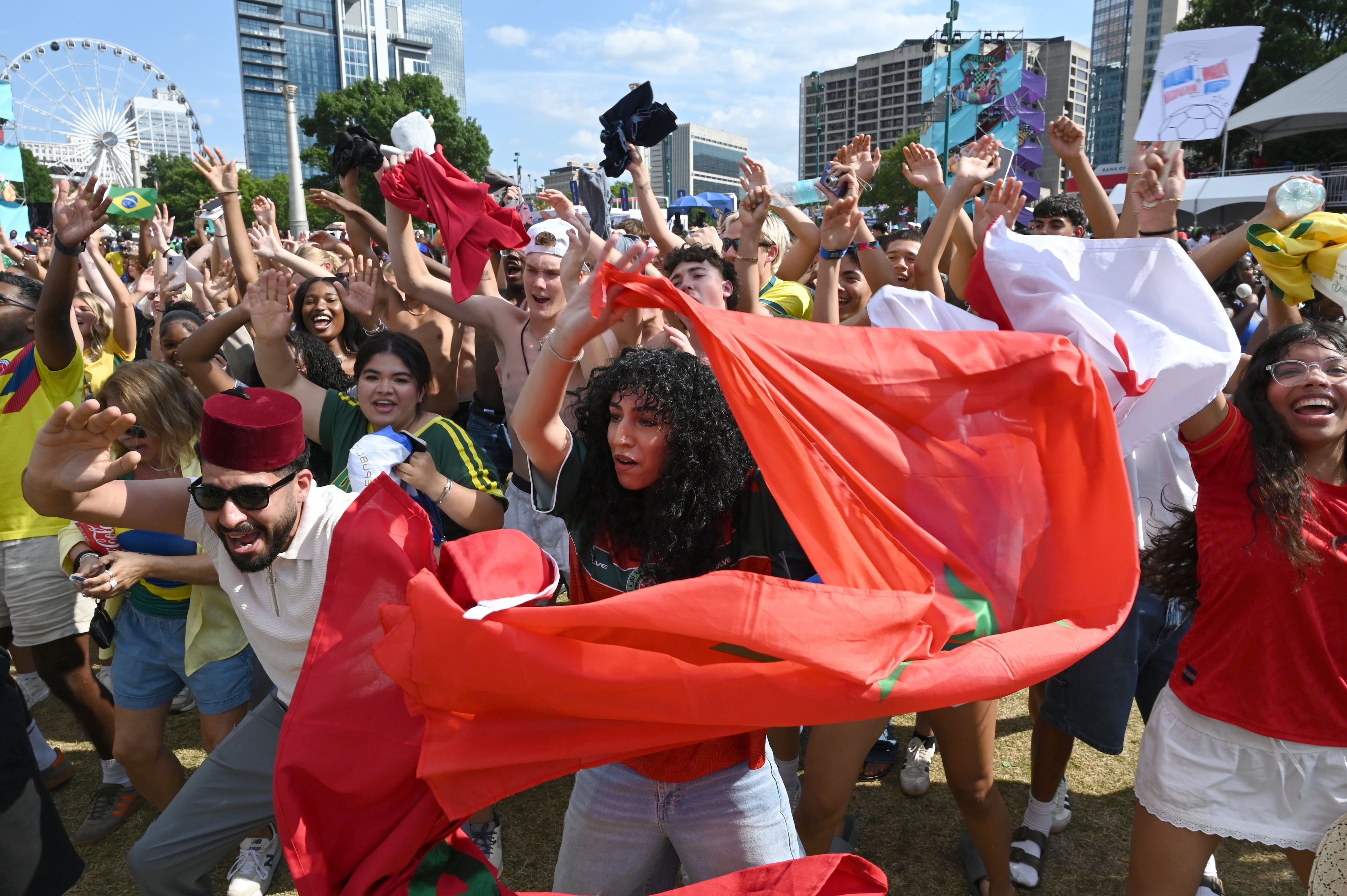 Morocco fans cheer as they gather to watch the match between Morocco vs. Haiti at the FIFA Fan Festival in Centennial Olympic Park on Wednesday, June 24, 2026, in Atlanta. (Hyosub Shin/AJC)
