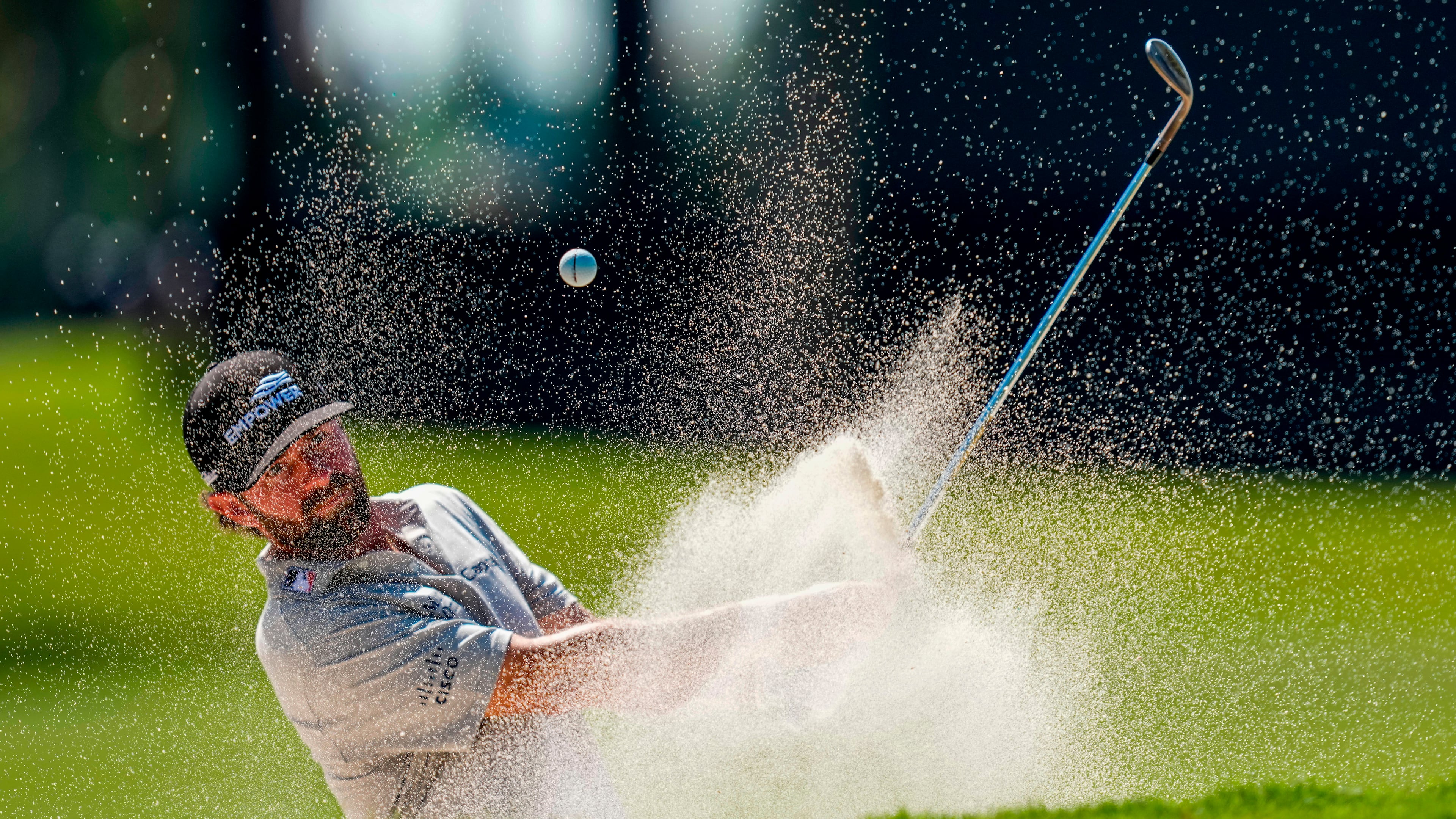 Cameron Young hits from the bunker on the eighth green during the second round of the Cadillac Championship PGA golf tournament Friday, May 1, 2026, in Doral, Fla. (AP Photo/David J. Phillip)
