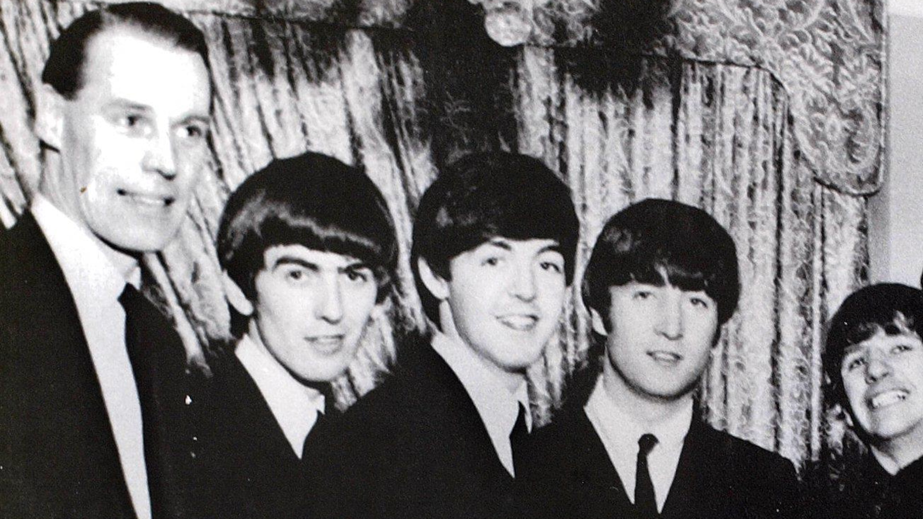 George Martin with The Beatles.