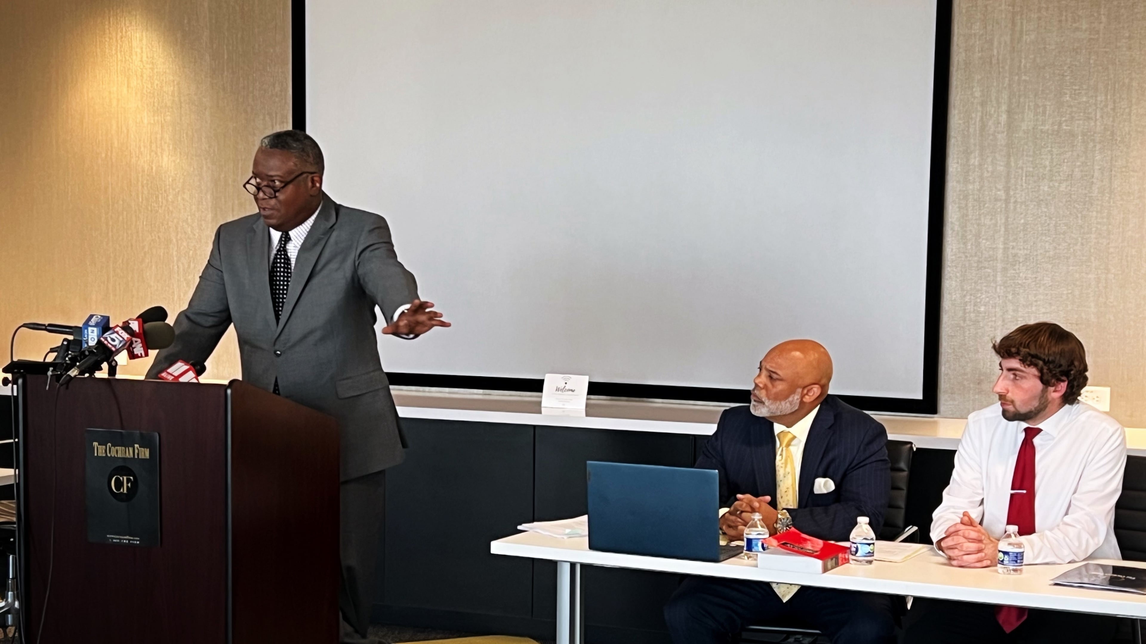 Civil rights attorney Sam Starks (left), criminal defense attorney Torris Butterfield (center) and Tyler Canaris at a news conference announcing their intention to file a civil rights complaint against the Paulding County Sheriff's Office.