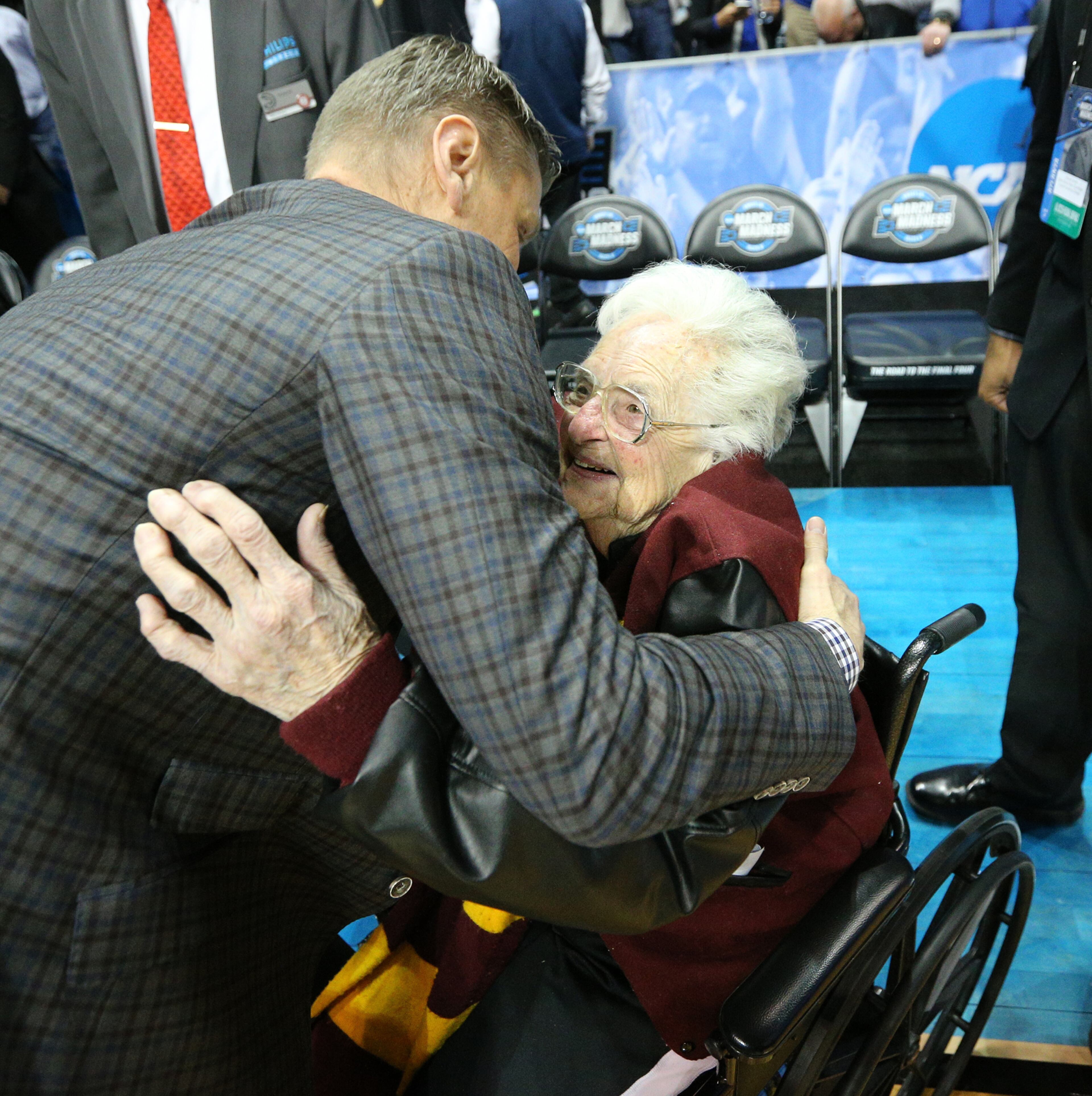 March 22, 2018 Atlanta: Loyola head coach Porter Moser hugs team chaplain Sister Jean Dolores Schmidt after beating Nevada 69-68 during a regional semifinal NCAA college basketball game on Thursday, March 22, 2018, in Atlanta. Curtis Compton/ccompton@ajc.com