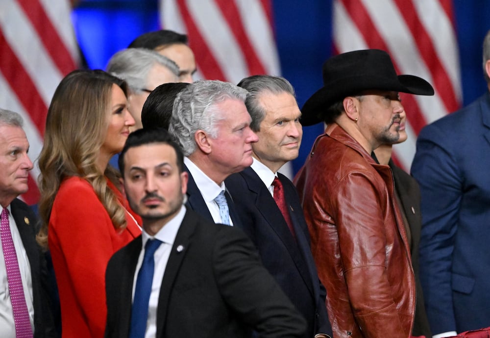 Republican U.S. Senate nominee Mike Collins, center left, and Georgia Republican governor nominee Rick Jackson, center right, are seen during a campaign rally at Guardian Centers on Saturday in Perry. (Hyosub Shin/AJC)