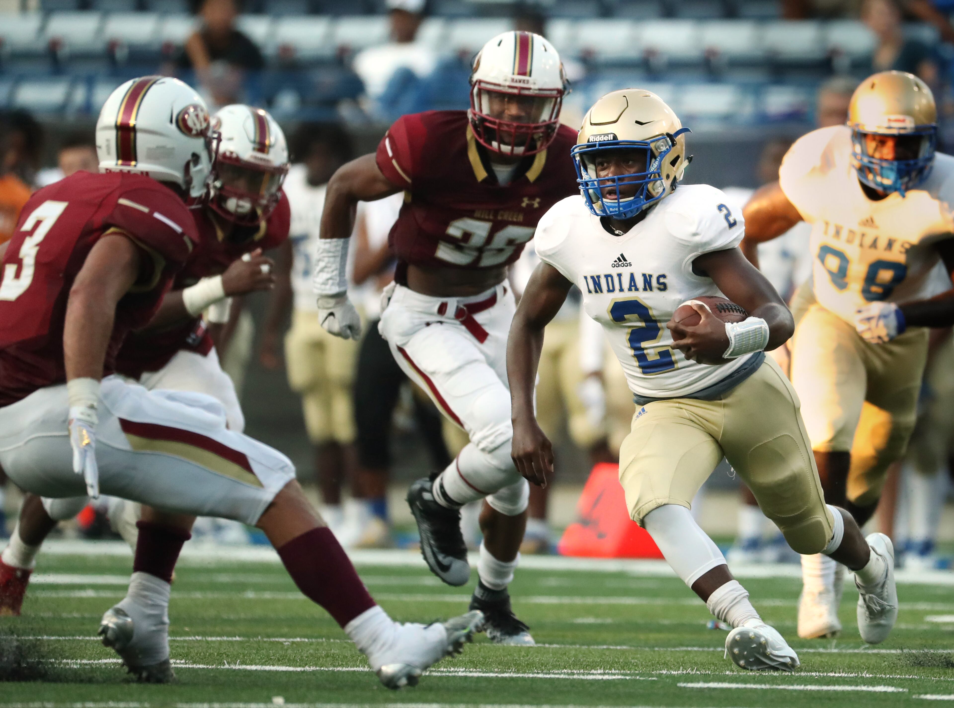 McEachern quarterback Malik Evans (2) runs for a 41-yard touchdown in the first half of their game against Mill Creek during the Corky Kell Classic at Georgia State Stadium Saturday, August 19, 2017, in Atlanta.