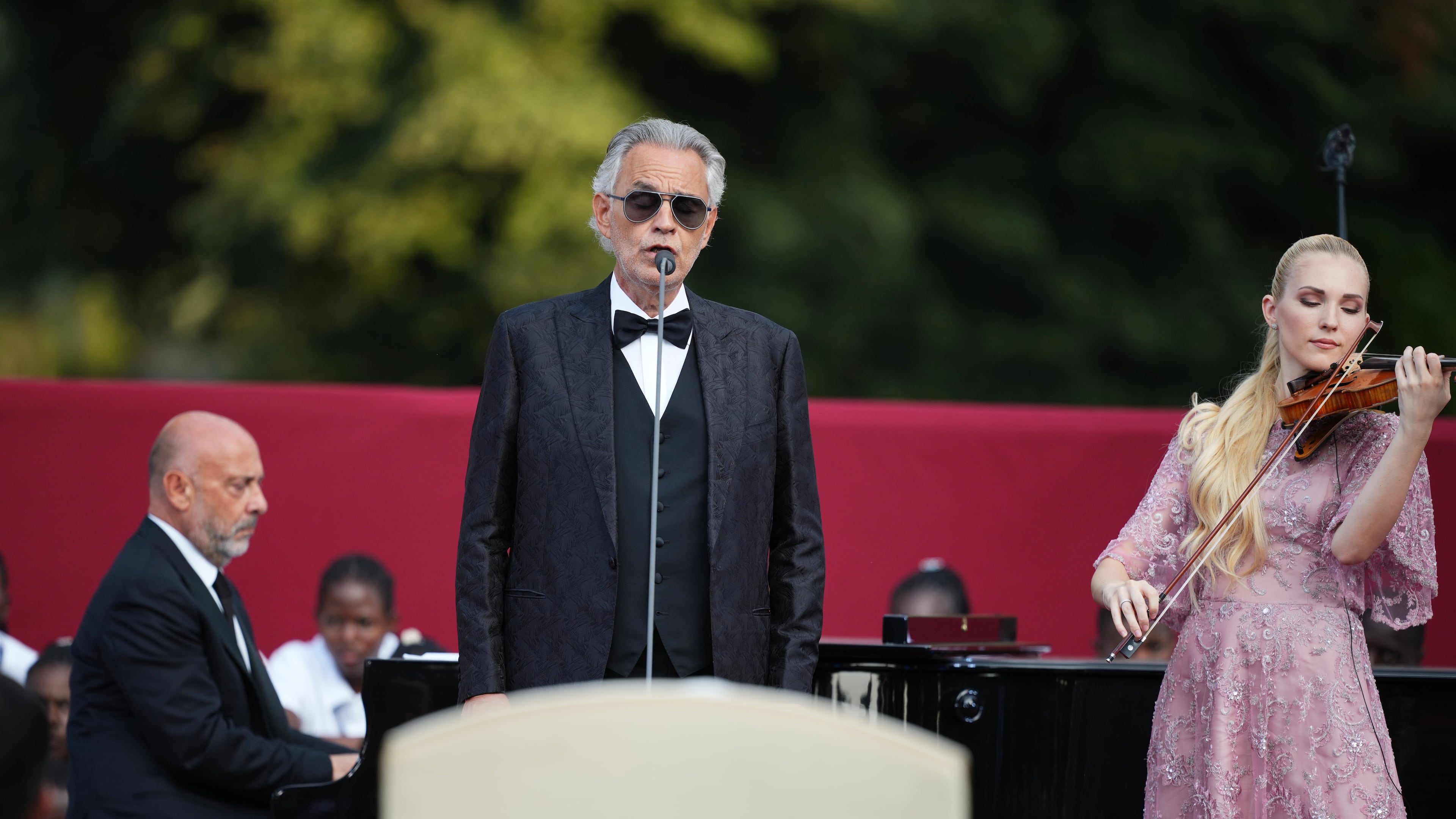 FILE -Italian singer Andrea Bocelli performs during the "Canticle of Peace" prayer and fraternity meeting with Pope Leo XIV at Borgo Laudato Si' in Castel Gandolfo, about 30 kilometers (19 miles) southwest of Rome, Italy, July 29, 2026. (AP Photo/Alessandra Tarantino, File)