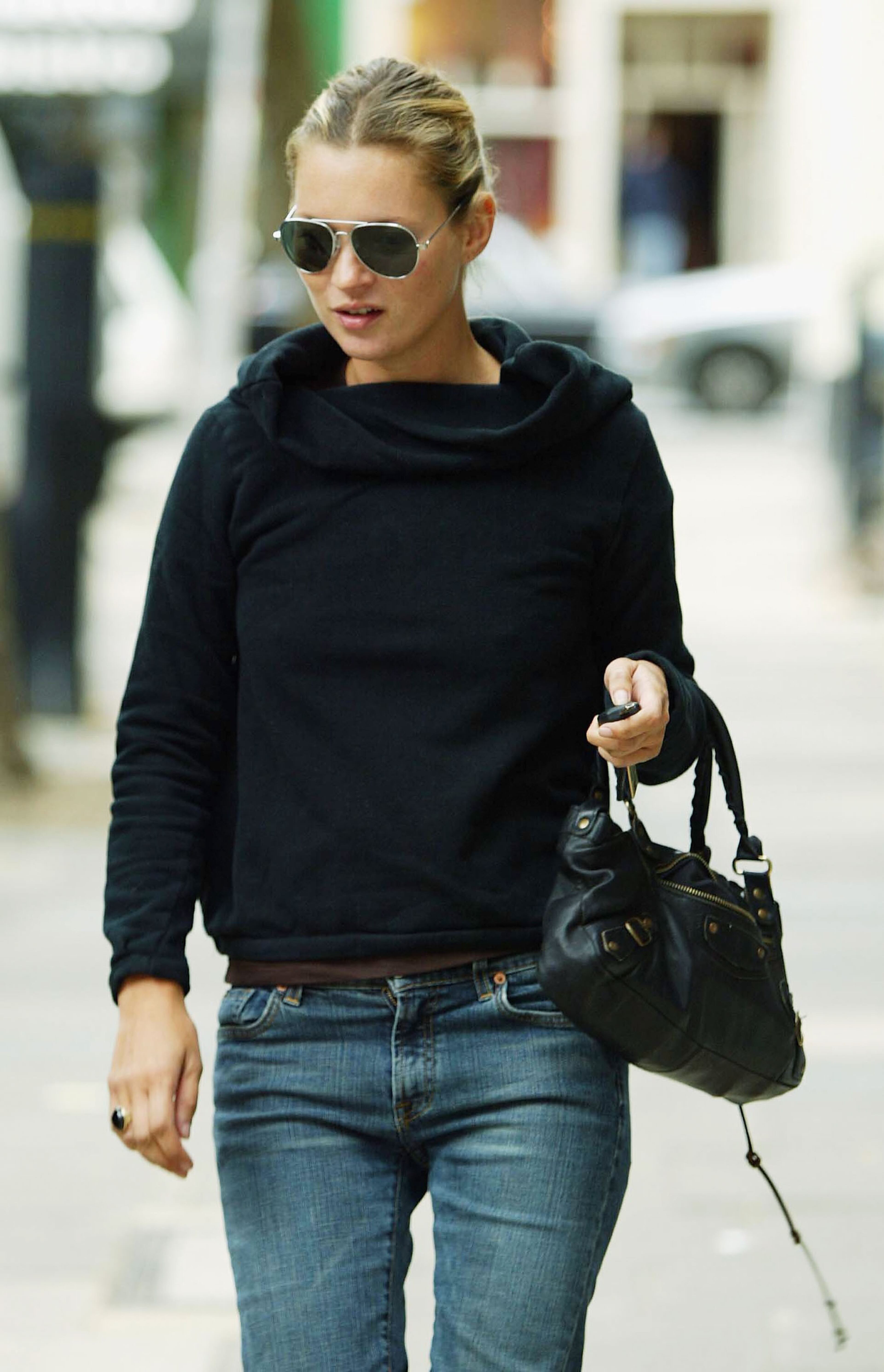 Model Kate Moss walks down a North London street September 1, 2003 in London.